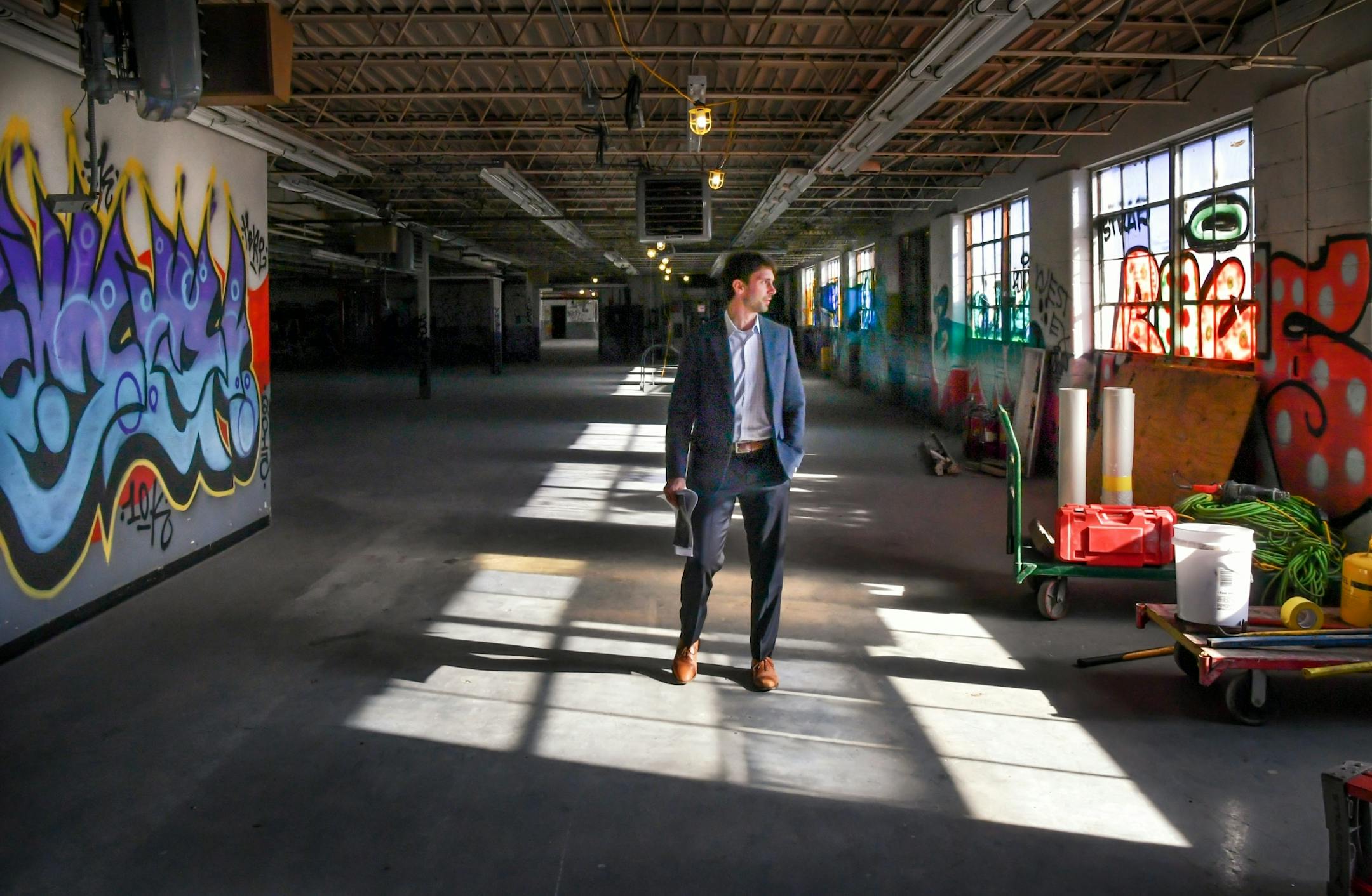 Developer David Wellington, plans for the long vacant Leef cleaning complex include housing and office space. He said graffiti will likely remain depending on the office clients.