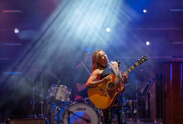Sheryl Crow performs early in her band's set at The Ledge Amphitheater in Waite Park, Minn. Tuesday.