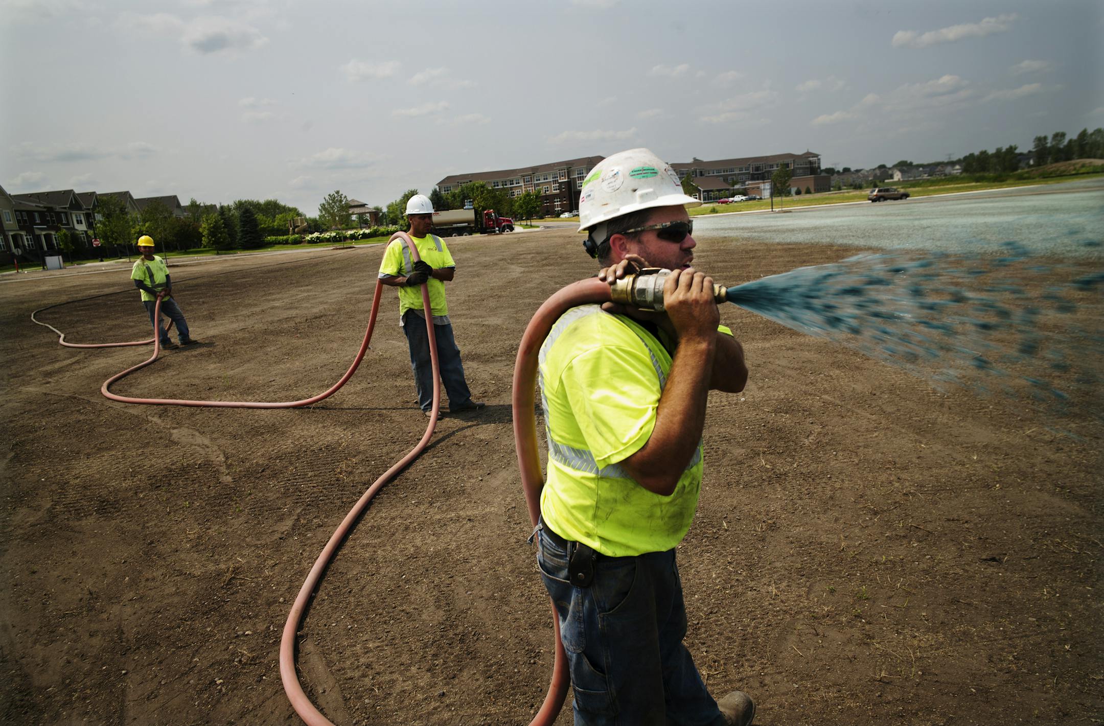 James McConnell led a landscaping crew recently as it worked to create several acres of lawn space at Central Park in Maple Grove.