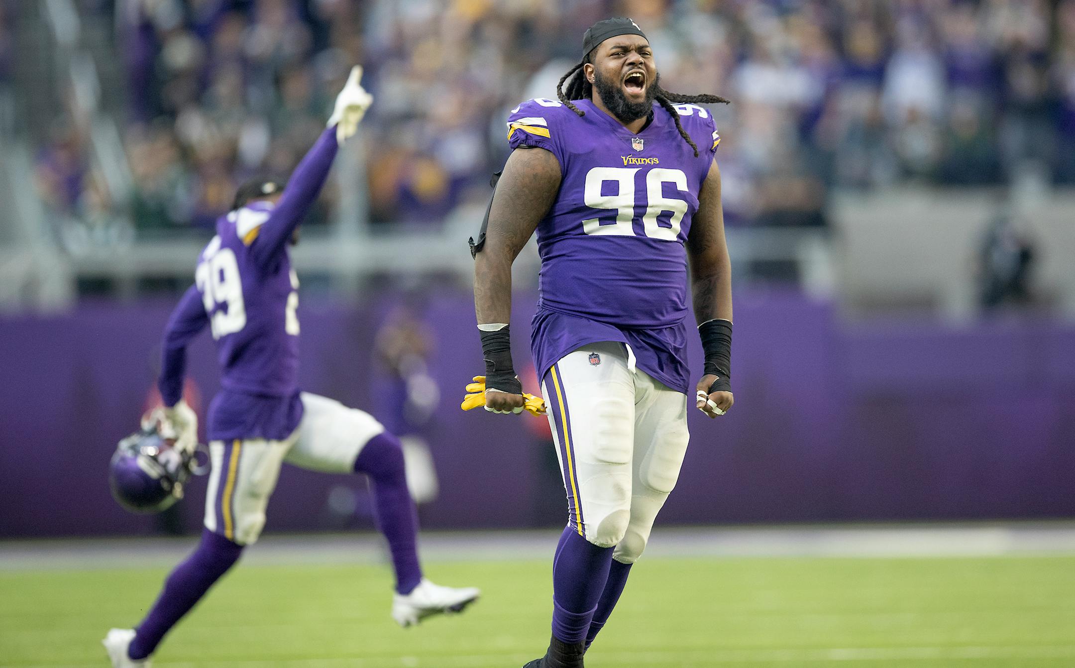 Vikings defensive tackle Armon Watts (96) celebrated the 34-31 win over the Packers.