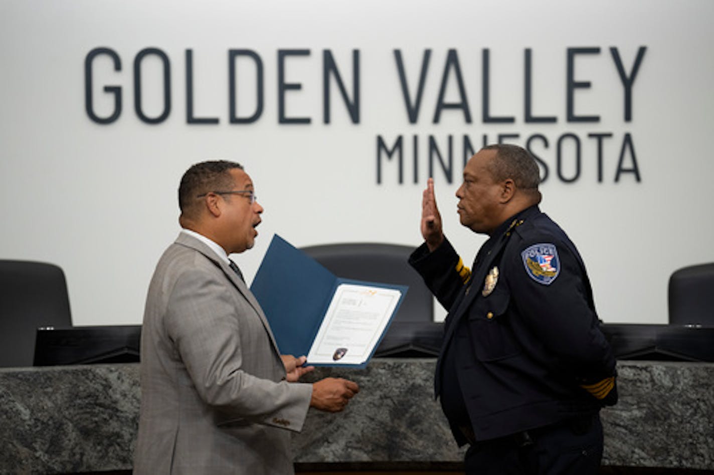 Virgil L. Green, Sr. was sworn in as the new police chief of Golden Valley by Minnesota Attorney General Keith Ellison in a ceremony at the start of the city council meeting Tuesday night, September 6, 2022 at City Hall in Golden Valley, Minn. Green is the first Black police chief for the city. ] JEFF WHEELER • Jeff.Wheeler@startribune.com