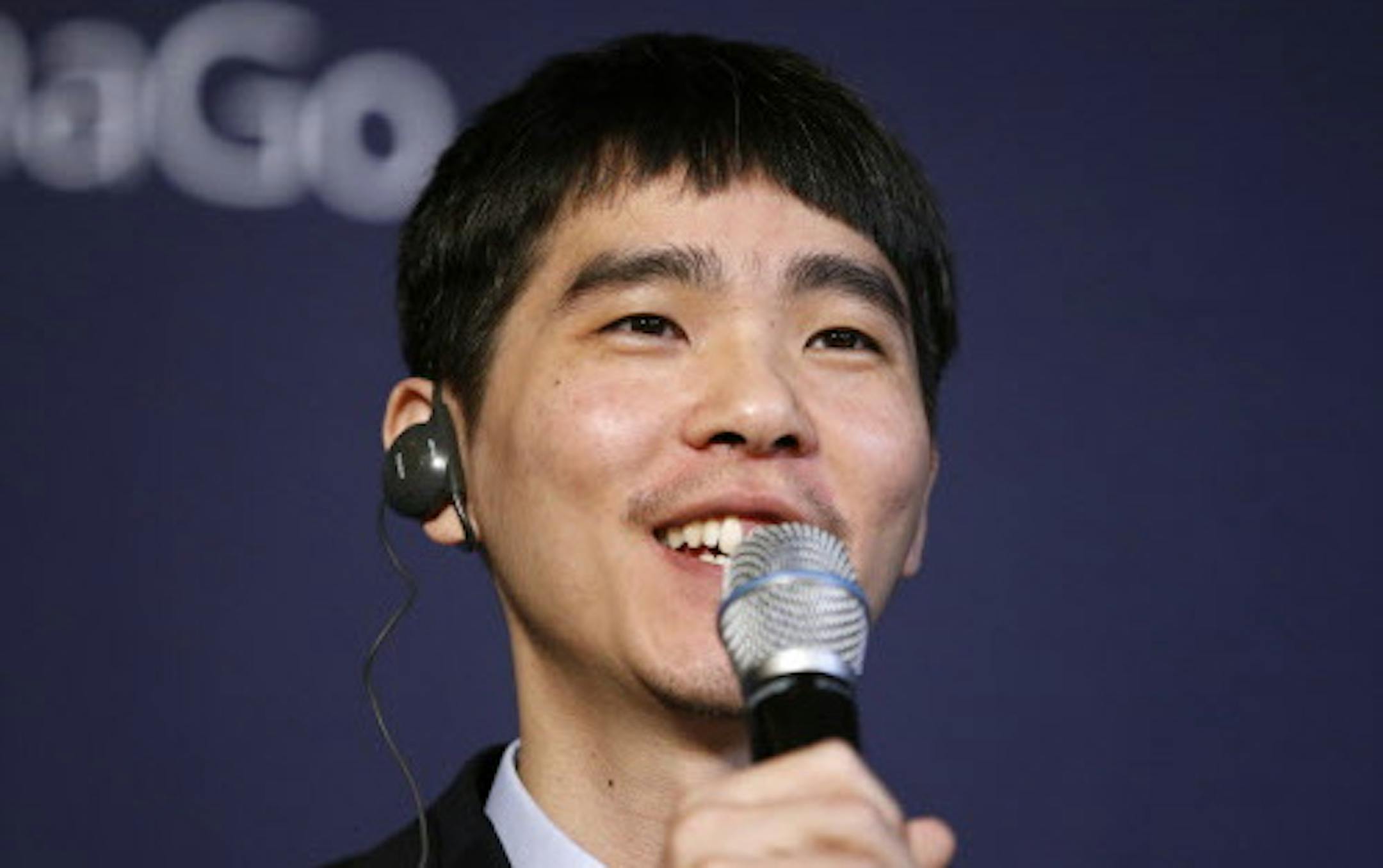 South Korean professional Go player Lee Sedol answers a reporter's question during a press conference after finishing the final match of the Google DeepMind Challenge Match against Google's artificial intelligence program, AlphaGo, in Seoul, South Korea, Tuesday, March 15, 2016. Google's Go-playing computer program again defeated its human opponent in a final match on Tuesday that sealed its 4:1 victory. (AP Photo/Lee Jin-man)