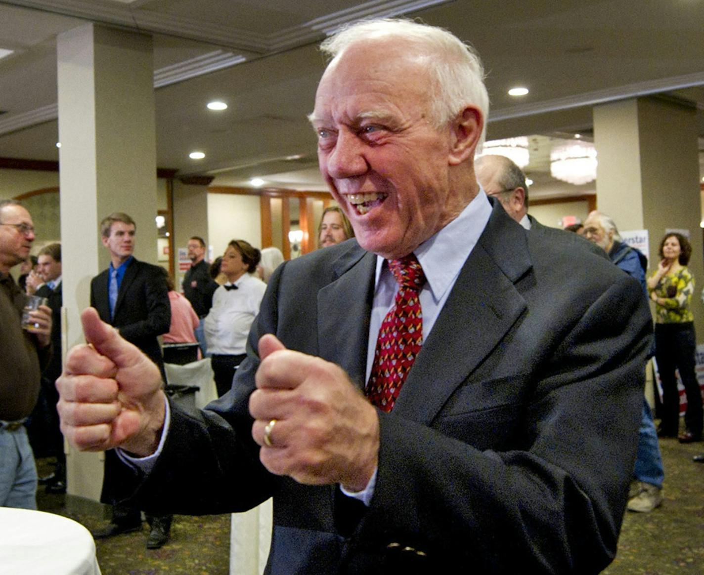 PLEASE CORRECT CAPTION TO SHOW DAVE BREWSTER/ STAR TRIBUNE MINNEAPOLIS NOT DULUTH NEWS TRIBUNE. Democratic Rep. James Oberstar reacts to election results on the large screen TV at his election night headquarters Tuesday Nov. 2, 2010 at the Holiday Inn Duluth, Minnesota. (AP Photo/The Duluth News-Tribune, Dave Brewster) ORG XMIT: MIN2014050316022630