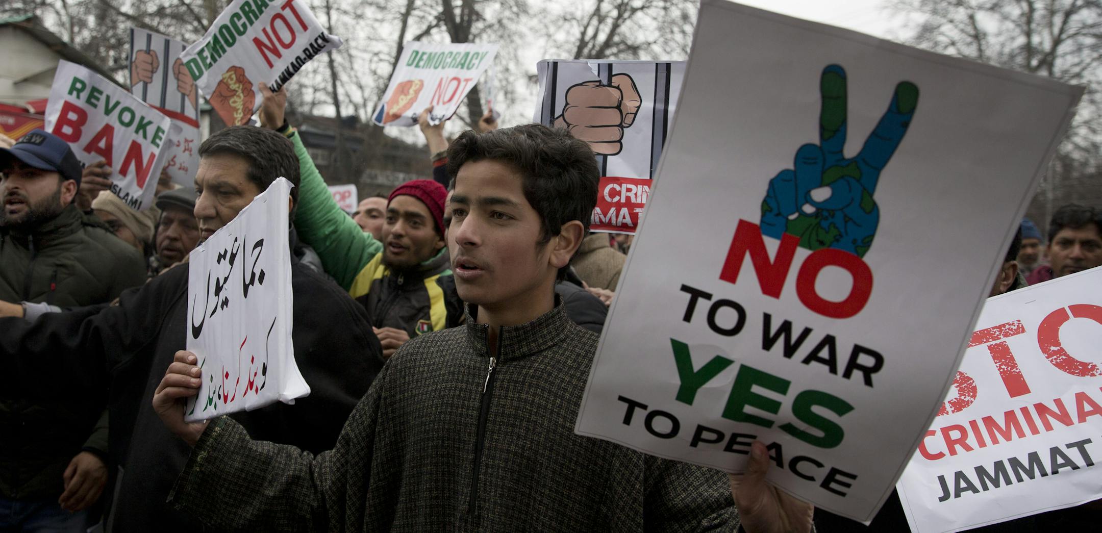 Kashmiri supporters of the Peoples Democratic Party (PDP) shout slogans against banning of Jama'at-e-Islami, the largest political and religious group in Indian-controlled Kashmir, during a protest in Srinagar, Indian controlled Kashmir, Saturday, March 2, 2019. India has banned the group in Kashmir in a sweeping and ongoing crackdown against activists seeking the end of Indian rule in the disputed region amid most serious confrontation between India and Pakistan in two decades. (AP Photo/ Dar Y