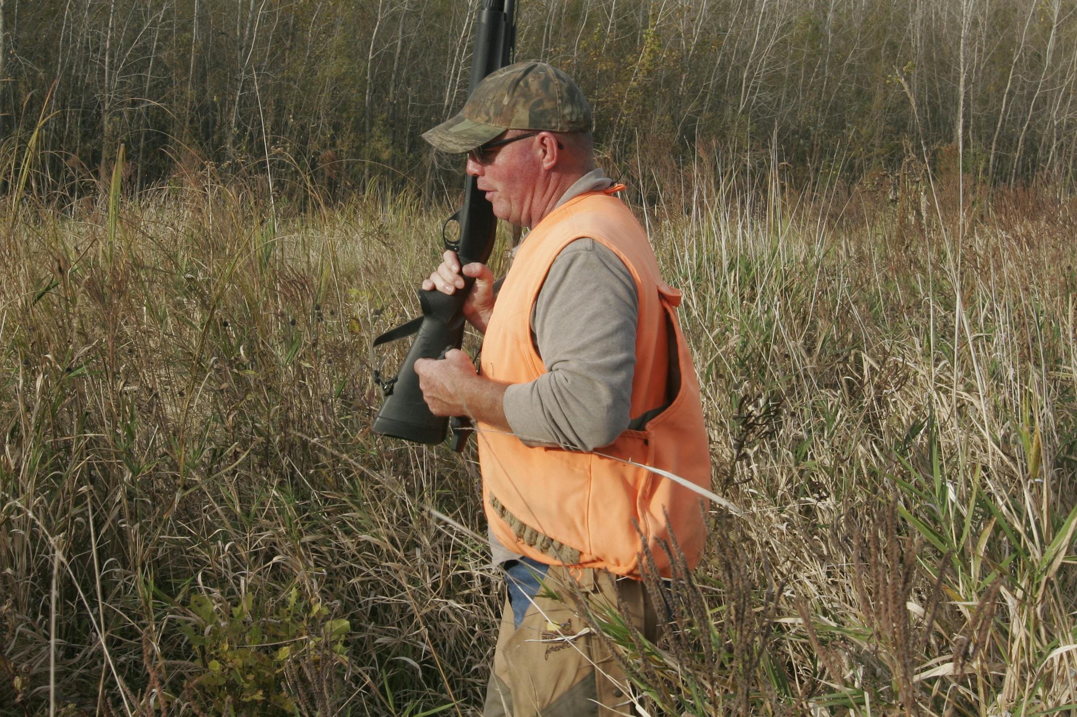 Mike Stevenson of Nicollet hunts land he owns near the Minnesota River that was removed from agricultural production and permanently protected under the Conservation Reserve Enhancement Program 15 years ago. "This land regularly floods; it never should have been farmed,'' he said. Star Tribune photo by Doug Smith