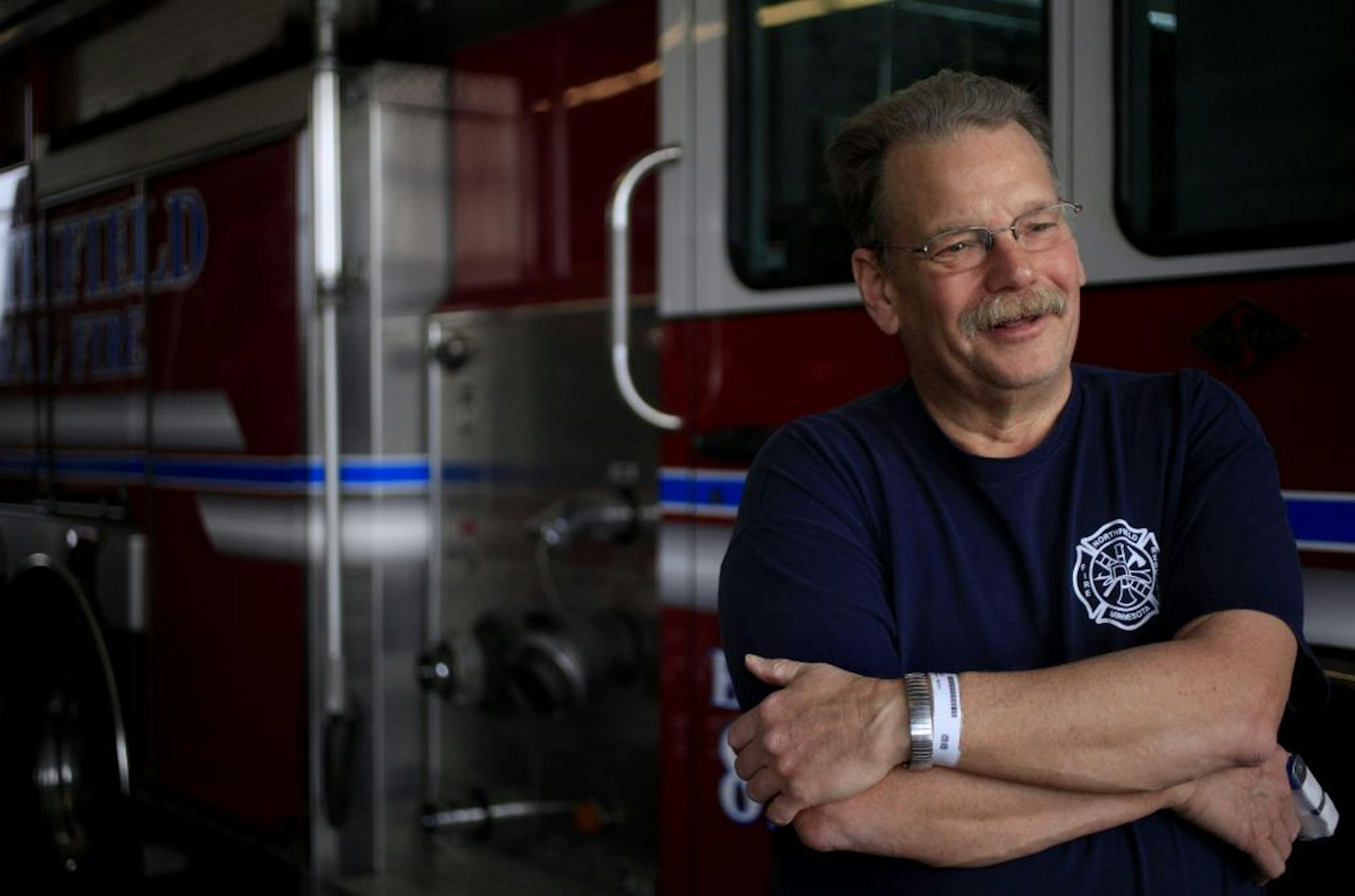 Volunteer firefighter Mike Kruse has been hanging out at the Northfield Fire Station for nearly 40 years. The recently retired electrician has lived in the old downtown station since he was 20. In recent years he's the only paid-on call firefighter sleeping at the station. When he gets dispatch calls at night, Kruse slides down the fire pole, maps the fastest route the scene and warms up the first fire truck that he will drive as soon as a few other firefighters arrive, grab their turnout gear a