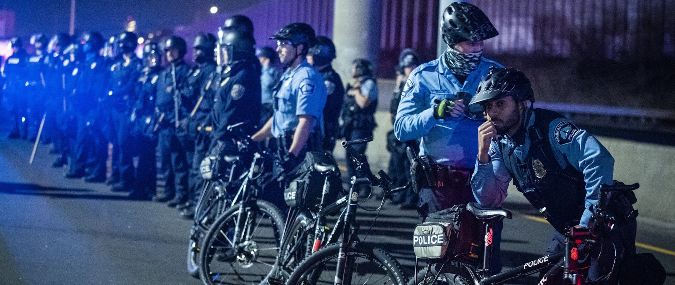 Minneapolis police held a line to box in protesters on Interstate 94 on Nov. 4.