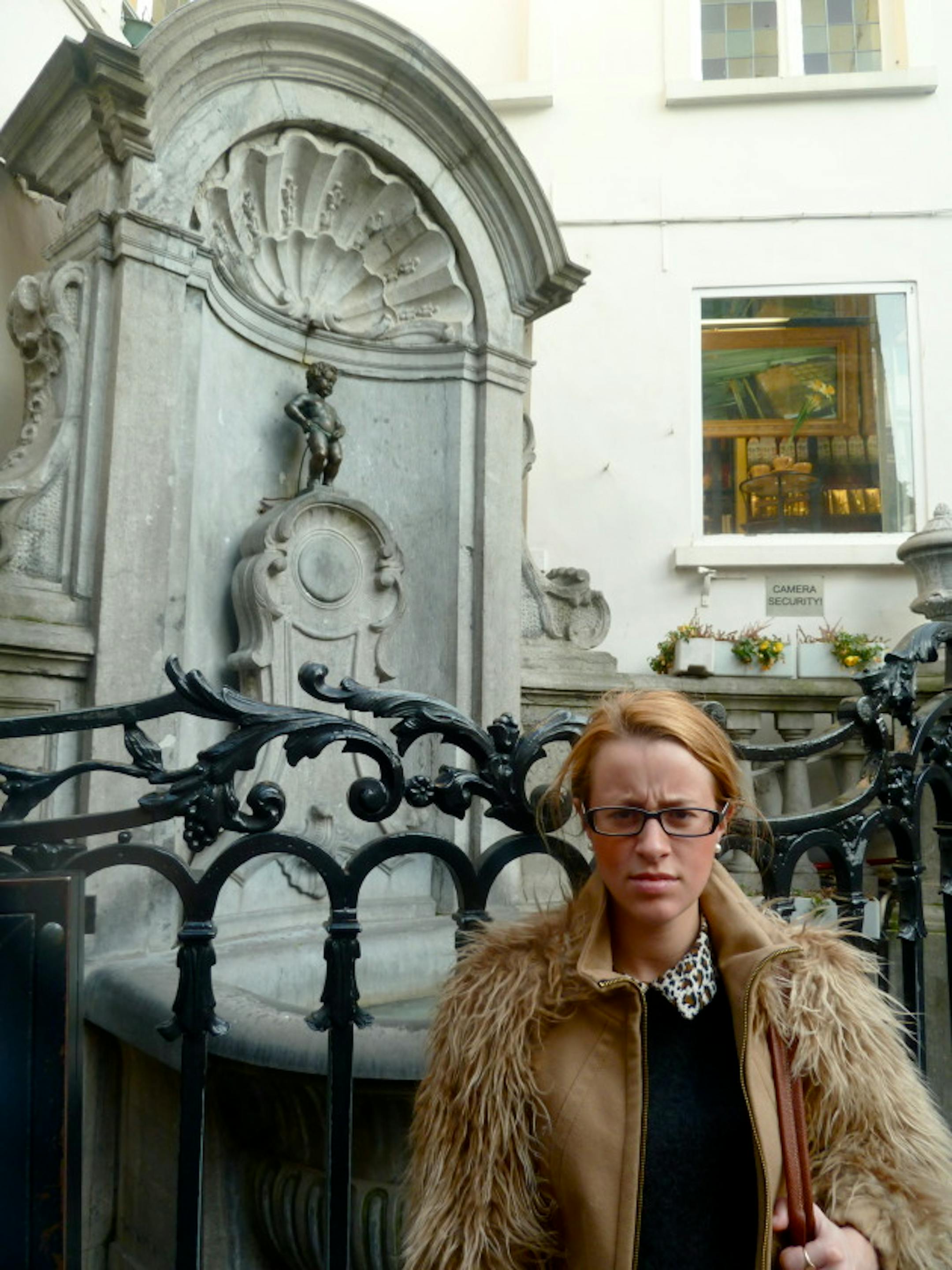 Posing with the Mannekin Pis- recreating a photo from when I was younger and absolutely DISGUSTED that anyone could expect me to take a picture with a BOY PEEING. EW.