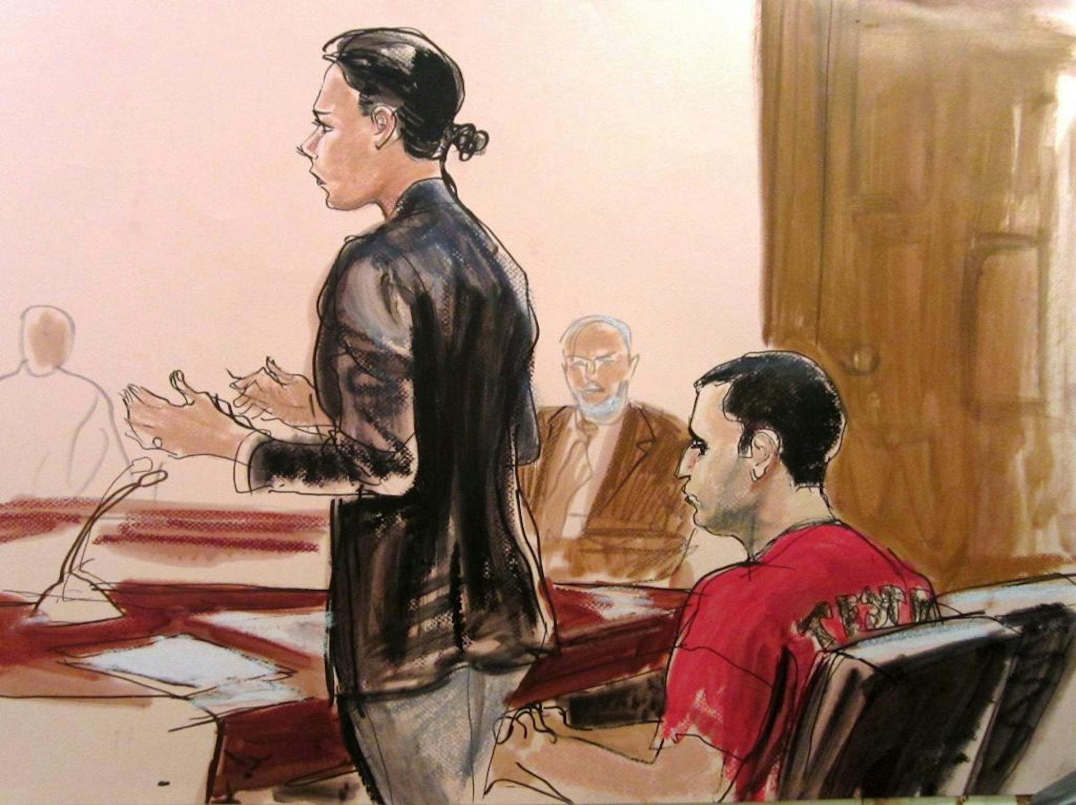 Gilberto Valle, right, and Federal Defender Julia Gatto, standing, are shown at a bail hearing in October. They are back in court today for the start of Valle's trial.