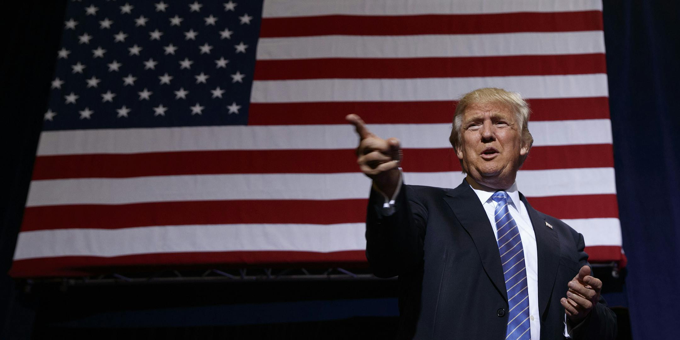Republican presidential candidate Donald Trump arrives to deliver an immigration policy speech during a campaign rally at the Phoenix Convention Center, Wednesday, Aug. 31, 2016, in Phoenix. (AP Photo/Evan Vucci) ORG XMIT: MIN2016090213571329