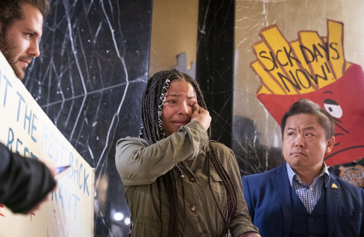 MJ Capers, 16, a former employee of Burger King who has filed a complaint with the city, wipes away tears while speaking during a demonstration at St. Paul City Hall. ] LEILA NAVIDI &#xa5; leila.navidi@startribune.com BACKGROUND INFORMATION: St. Paul workers who've filed complaints with the city about Earned Sick and Safe Time violations at their workplaces and organizers demonstrate at St. Paul City Hall and in the skyways on Wednesday, May 22, 2019. St. Paul's Earned Sick and Safe Time law wen