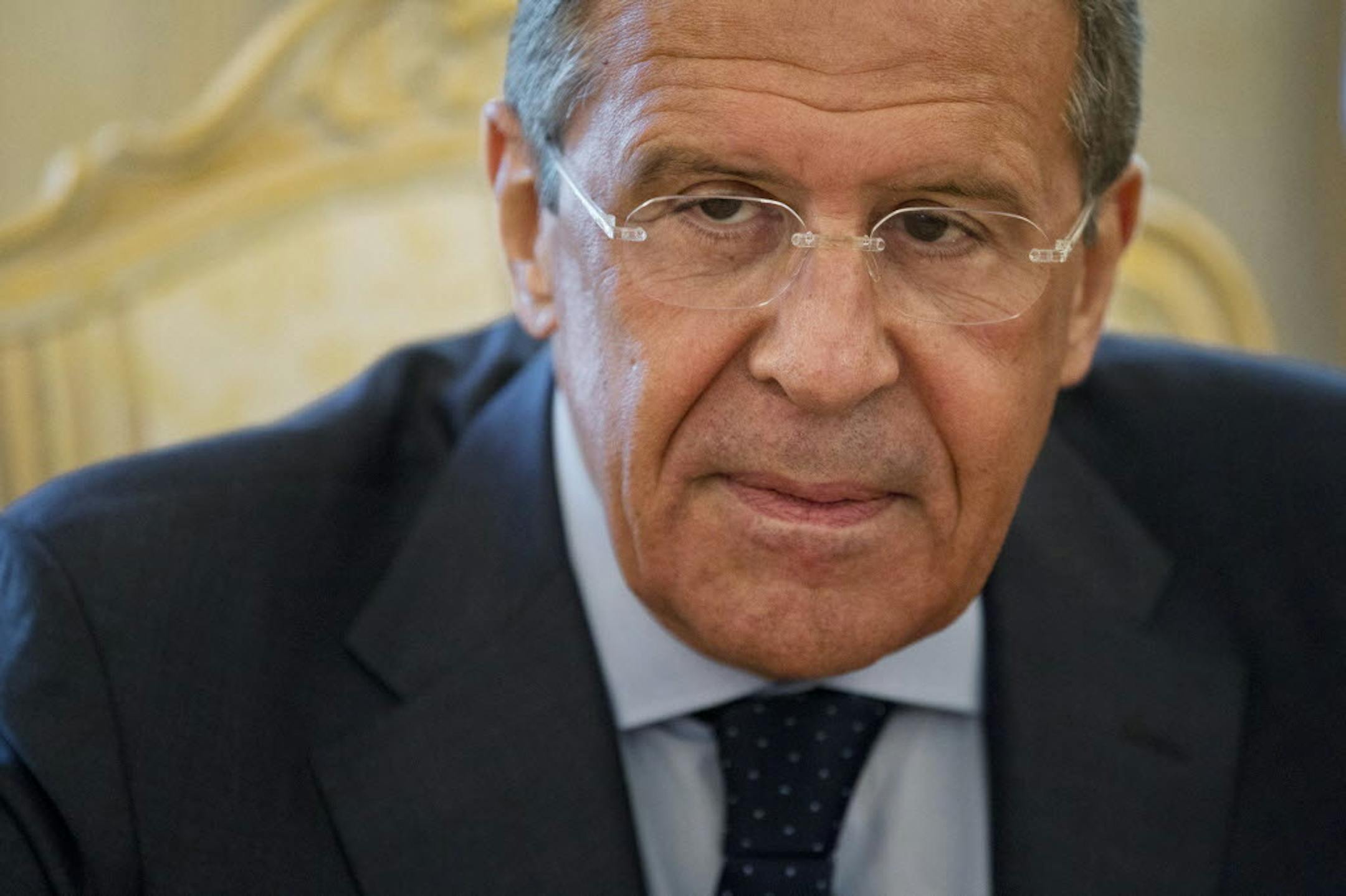Russian Foreign Minister Sergey Lavrov smiles during his meeting with Slovakia's Foreign Minister Miroslav Lajcak in Moscow, Russia, Monday, May 19, 2014.