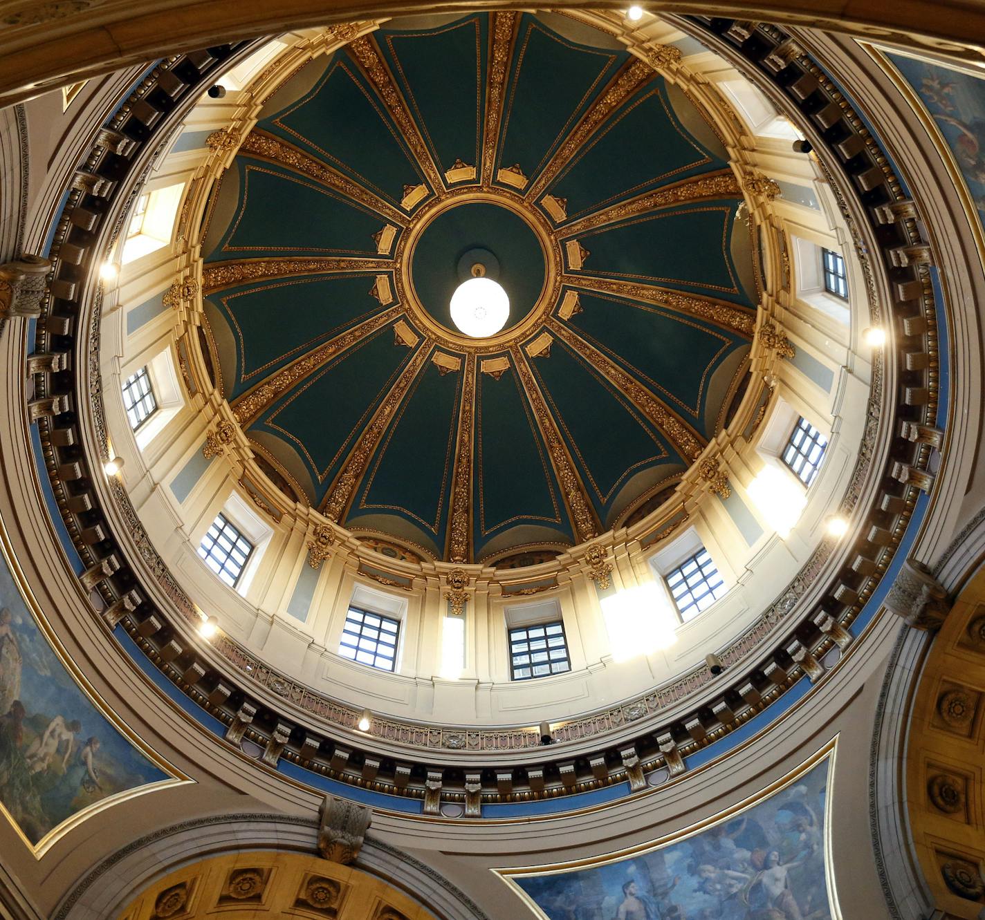 The chandelier was turned on after being raised in the rotunda at the Minnesota State Capitol on Thursday. The Chandelier lighting and raising ceremony took place after the Chandelier's two-year absence. ] CARLOS GONZALEZ cgonzalez@startribune.com - January 17, 2013, St. Paul, Minn., The Chandelier lighting and raising ceremony at the State Capitol starts at 4pm this Thursday 1/17. The Minnesota State Capitol's massive chandelier will soon be hanging high in the rotunda again after a two-year ab