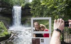 Julayne Kilcullen, 15, and her mother, Tyra Kilcullen, of the Denver area had their picture taken by Chris Kilcullen at Minnehaha Falls in south Minne