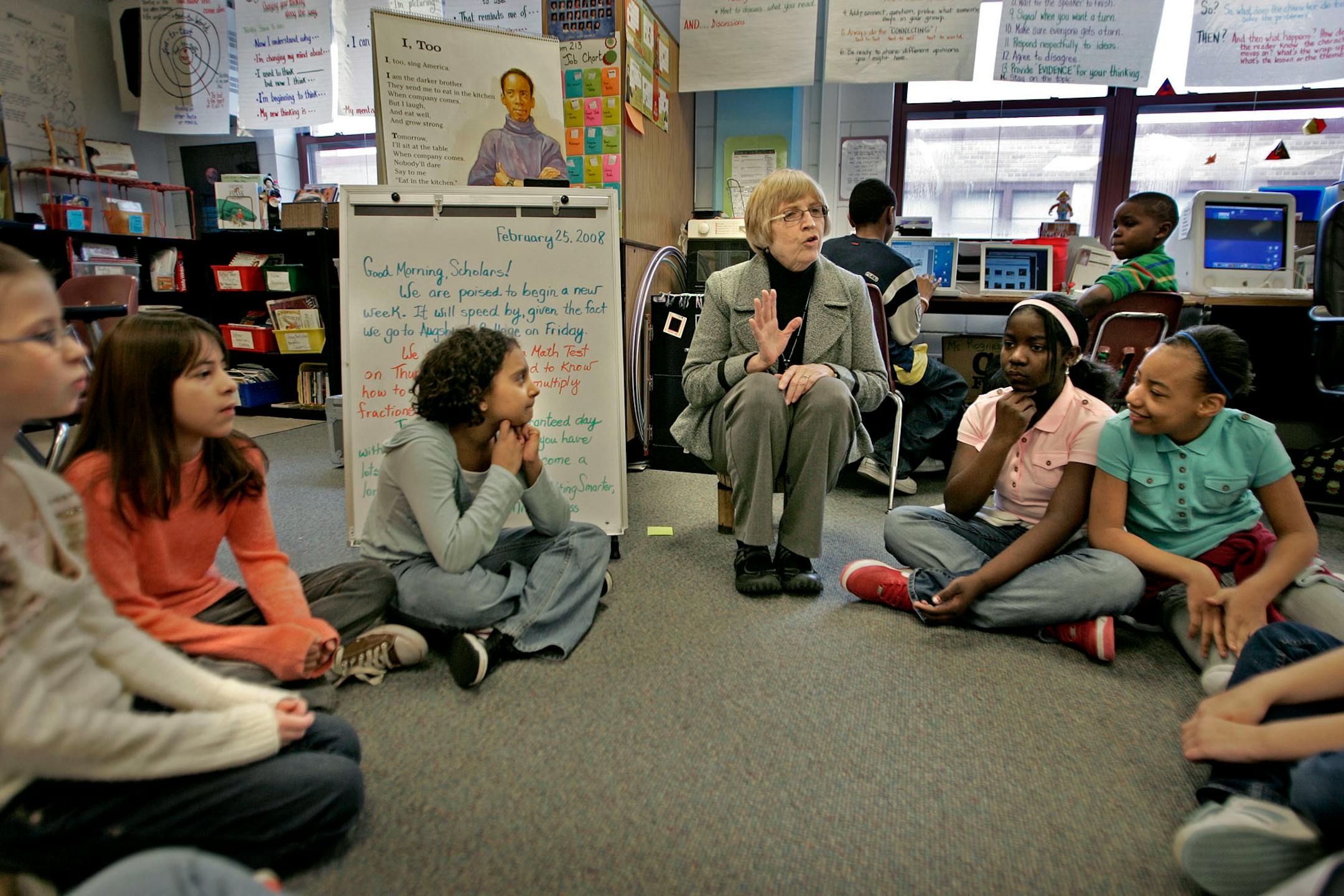Teacher Gerry Rogness, center, went through writing instructions with her fifth-grade students at Eastern Heights Elementary School. The school was awarded the 2007 Minnesota Academic Excellence Foundation's School Spotlight Award