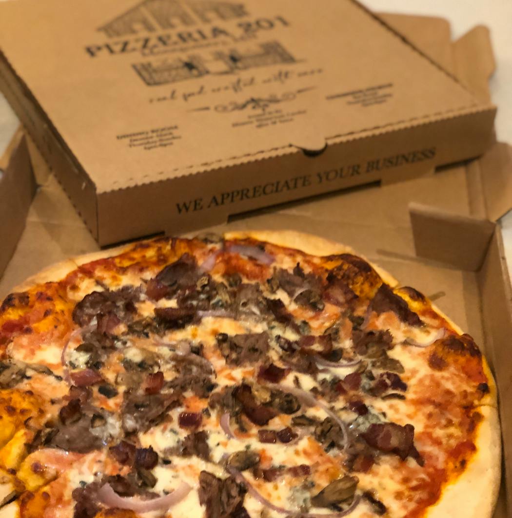 The Black & Bleu Pizza from Pizzeria 201 in Montgomery, Minn.