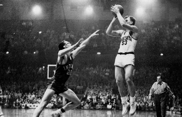 Dick Garmaker (shown in a 1955 game against Indiana), a consensus All-America basketball player for the Gophers who went on to play six seasons in the