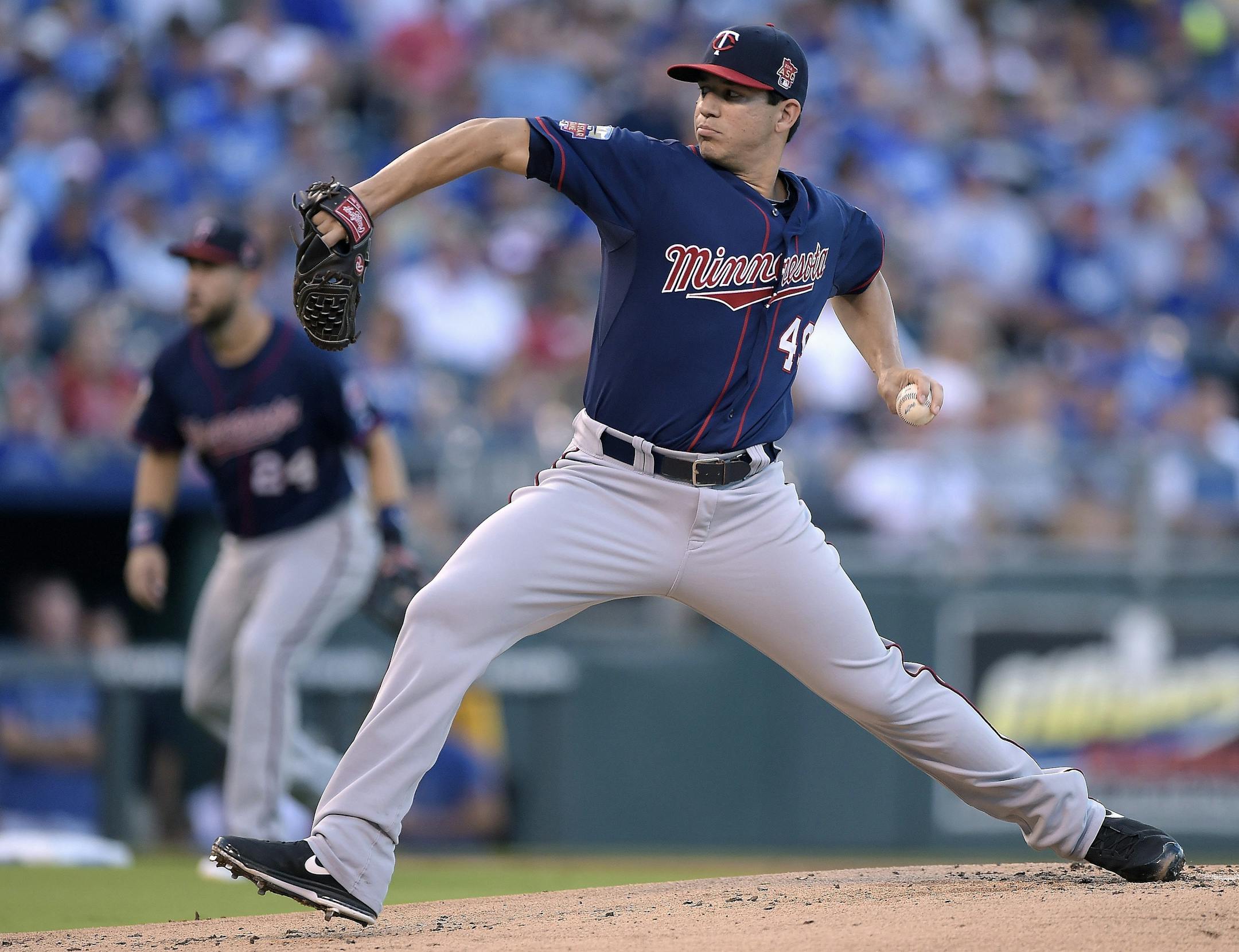 Minnesota Twins starting pitcher Tommy Milone throws in the first inning against the Kansas City Royals on Wednesday, Aug. 28, 2014, at Kauffman Stadium in Kansas City, Mo. (John Sleezer/Kansas City Star/MCT) ORG XMIT: 1156708