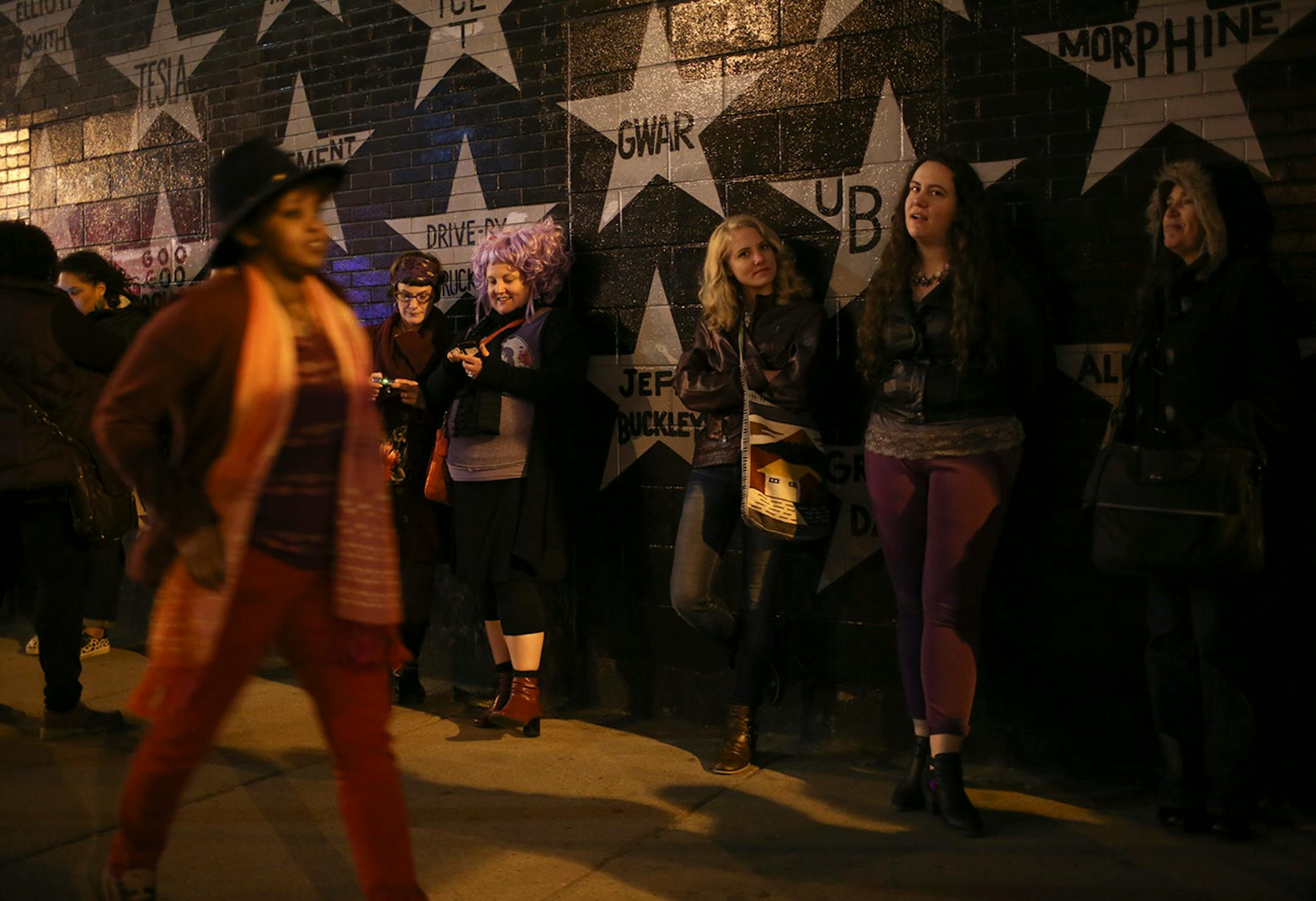 Poetry fans waited outside First Ave. late Wednesday night to enter The Record Room for The Prince Purple Poetry Party . ] JEFF WHEELER • jeff.wheeler@startribune.com One of the off-site events at the start of the AWP Conference & Bookfair was The Prince Purple Poetry Party Wednesday night, April 8, 2015 in The Record Room at First Ave. in Minneapolis. More than a dozen poets read poems they wrote that were inspired by the music of Prince.
