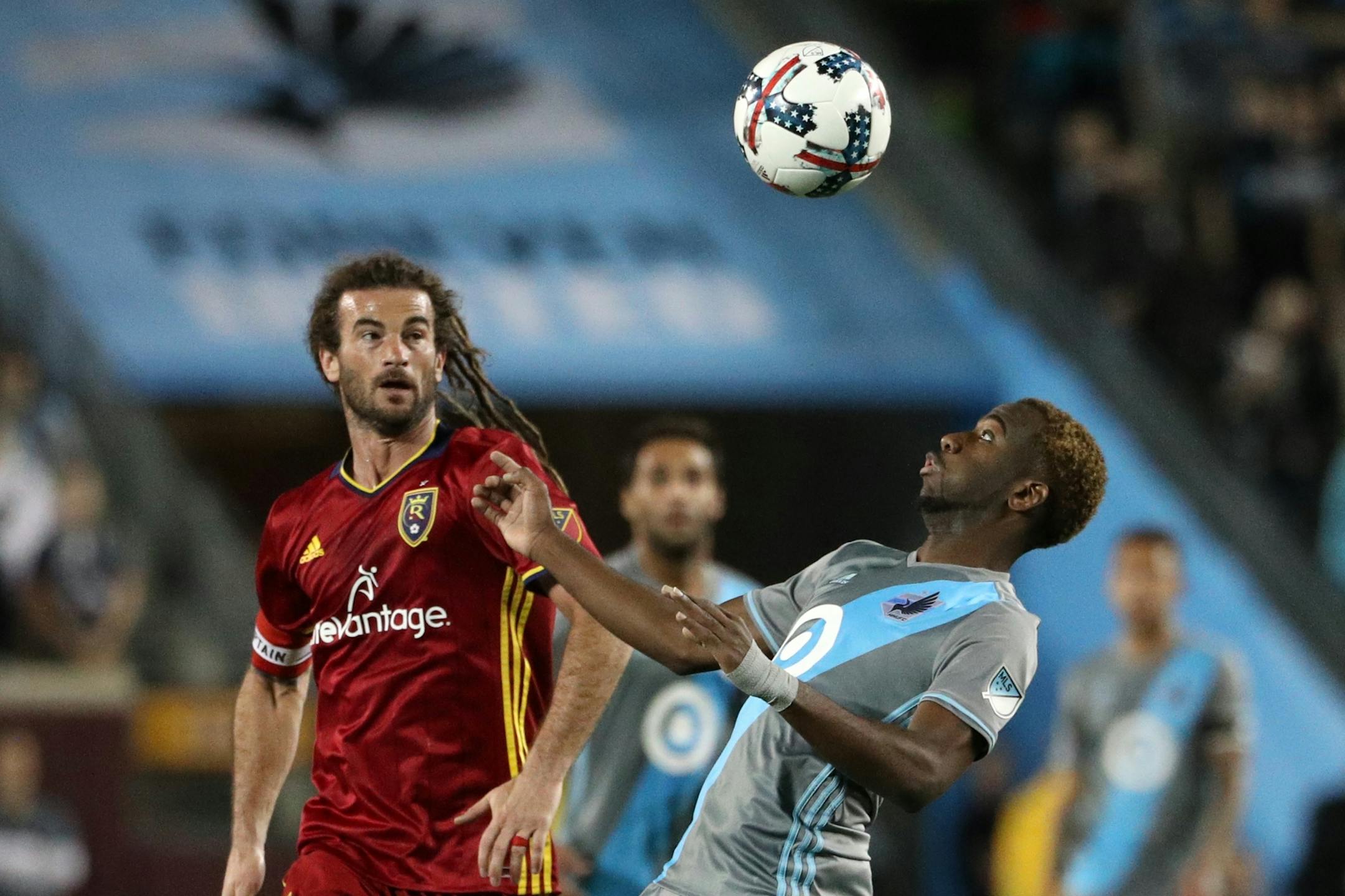 Minnesota United midfielder Kevin Molino (18) headed the ball as Real Salt Lake midfielder Kyle Beckerman (5) looked on in the second half.