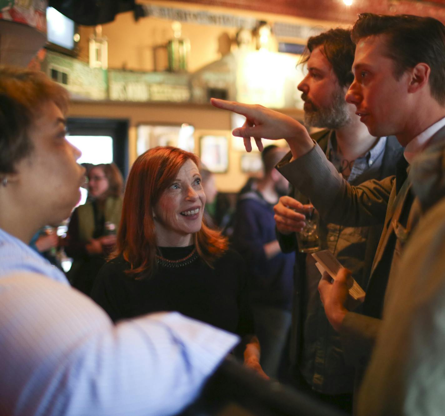 Literary Death Match creator and emcee Adrian Todd Zuniga, pointing, spoke with participants Roxane Gay, judge Susan Orlean, participant Mark Doten, and judge Benjamin Percy, from left, before the event Wednesday night at Nomad World Pub. ] JEFF WHEELER &#xef; jeff.wheeler@startribune.com One of the off-site events at the start of the AWP Conference & Bookfair was the Literary Death Match Wednesday night, April 8, 2015 at Nomad World Pub in Minneapolis. Four writers read their work and were judg