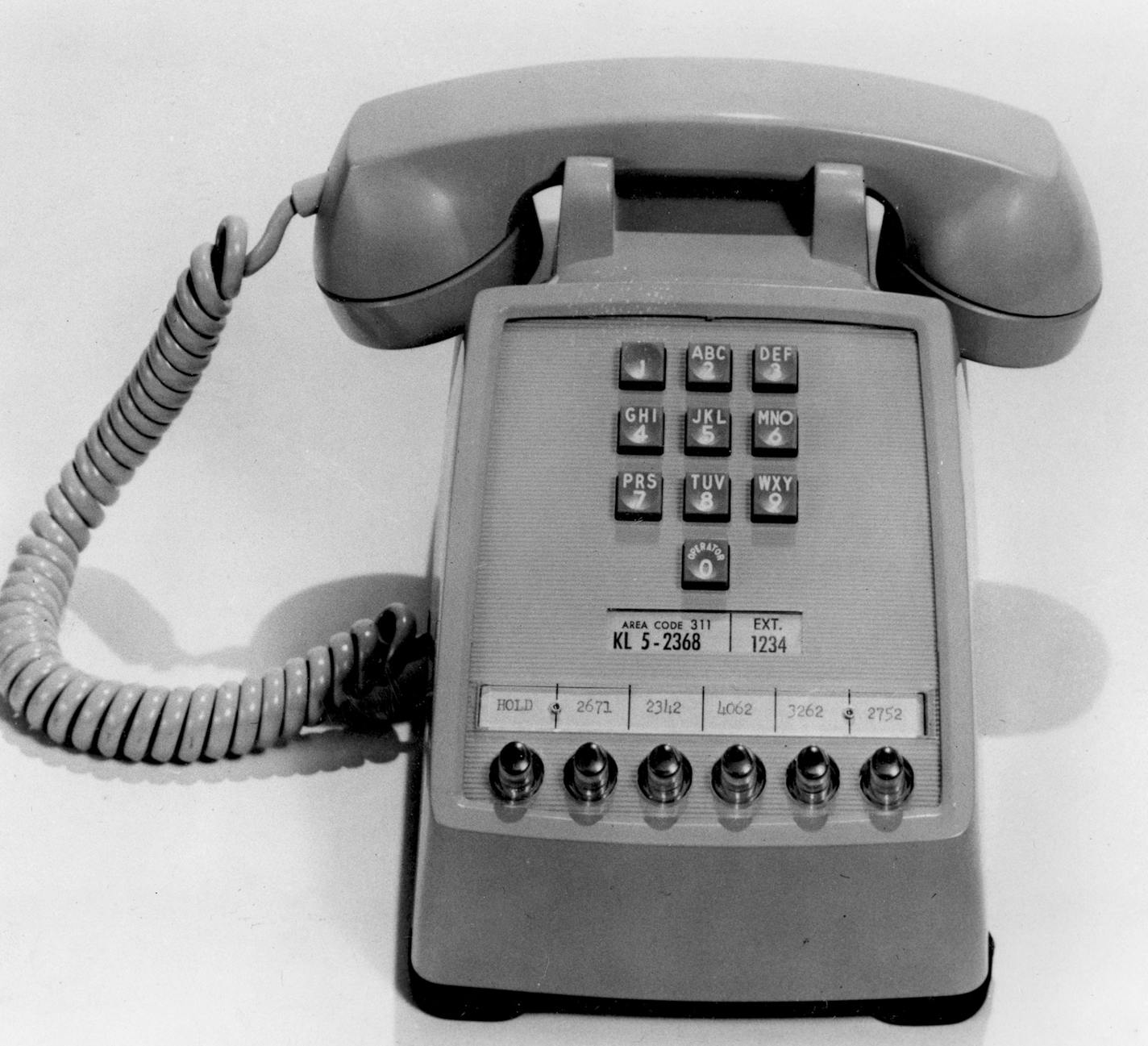 The first push-button telephone is introduced on Feb. 28, 1963. This phone has extension buttons at bottom for office use. (AP Photo) ORG XMIT: APHS163