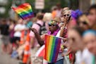 Spectators seemingly took ever last inch of sidewalk Sunday for the Minneapolis Gay Pride Parade.