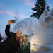 The Bartz Brothers unveiled their latest snow sculpture, a giant surprised snail, in front of their New Brighton, Minn. home this week. On Thursday, J