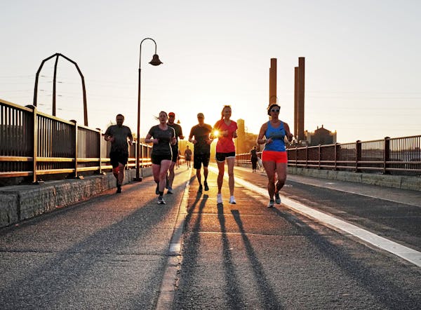 Runners made their way across the Stone Arch Bridge on April 14 in Minneapolis.