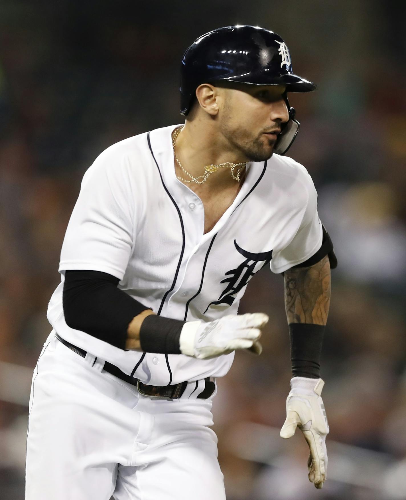 Detroit Tigers' Nicholas Castellanos doubles during the seventh inning of a baseball game against the Kansas City Royals, Saturday, Sept. 22, 2018, in Detroit. (AP Photo/Carlos Osorio)