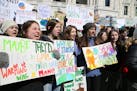 Minnesota students left school and went to the Capitol in St. Paul to be part of an international climate change protest, joining hundreds of thousand
