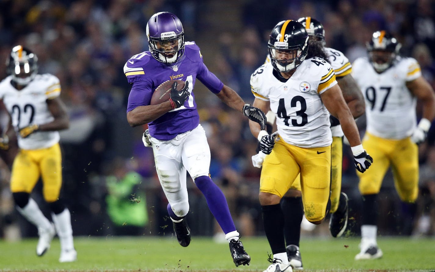 Minnesota Vikings receiver Jerome Simpson (81) was chased by Troy Polamalu (43) after a catch in third quarter. Minnesota beat Pittsburgh by a final score of 34-27. ] CARLOS GONZALEZ cgonzalez@startribune.com September 29, 2013, London, England (Minnesota Vikings in London) Wembley Stadium, NFL, Minnesota Vikings vs. Pittsburg Steelers ORG XMIT: MIN1309291550214921