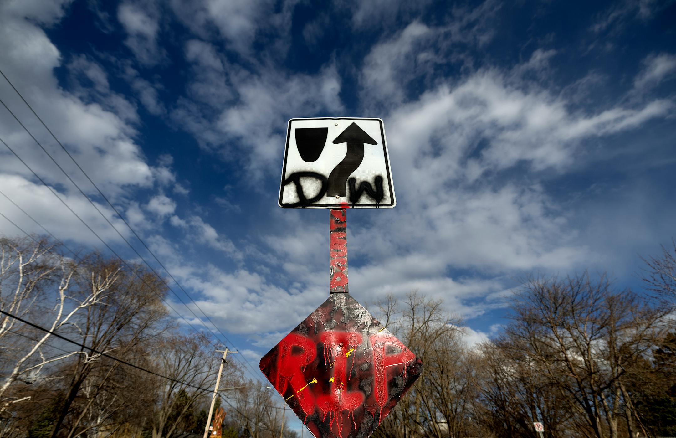 A sign leading up to a vigil honoring Daunte Wright on one-year anniversary of his death Monday, April 11, in Brooklyn Center, Minn.