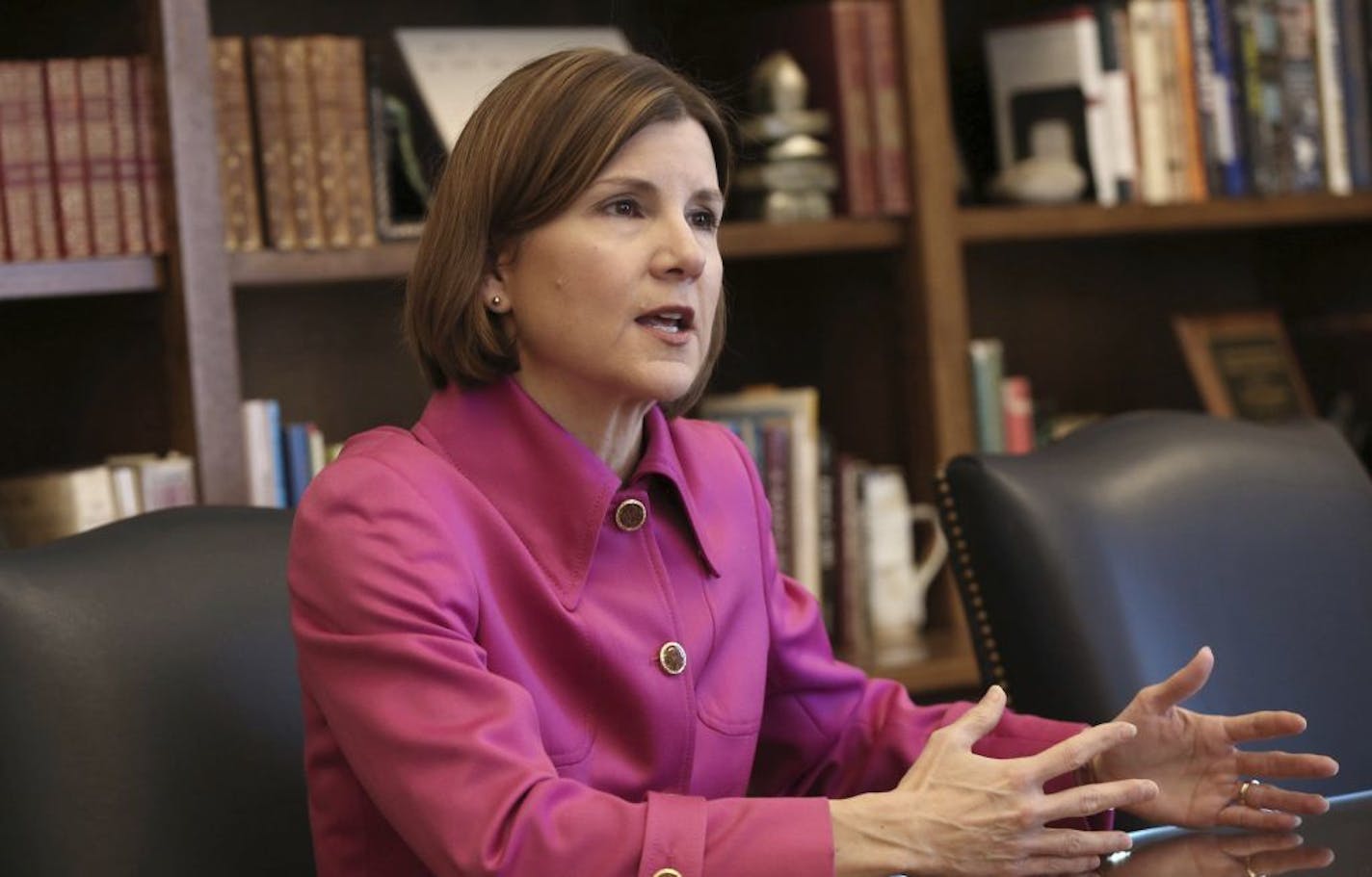 In this March 12, 2018 photo, Minnesota Attorney General Lori Swanson speaks during an interview at the State Capitol in St. Paul, Minn. Swanson said she's particularly proud of the $850 million settlement she reached with 3M last month in a lawsuit alleging the manufacturer's chemicals contaminated groundwater in the eastern Twin Cities metro area. It's the largest environmental settlement in Minnesota history, and the third-largest natural resource damage settlement in U.S. history.