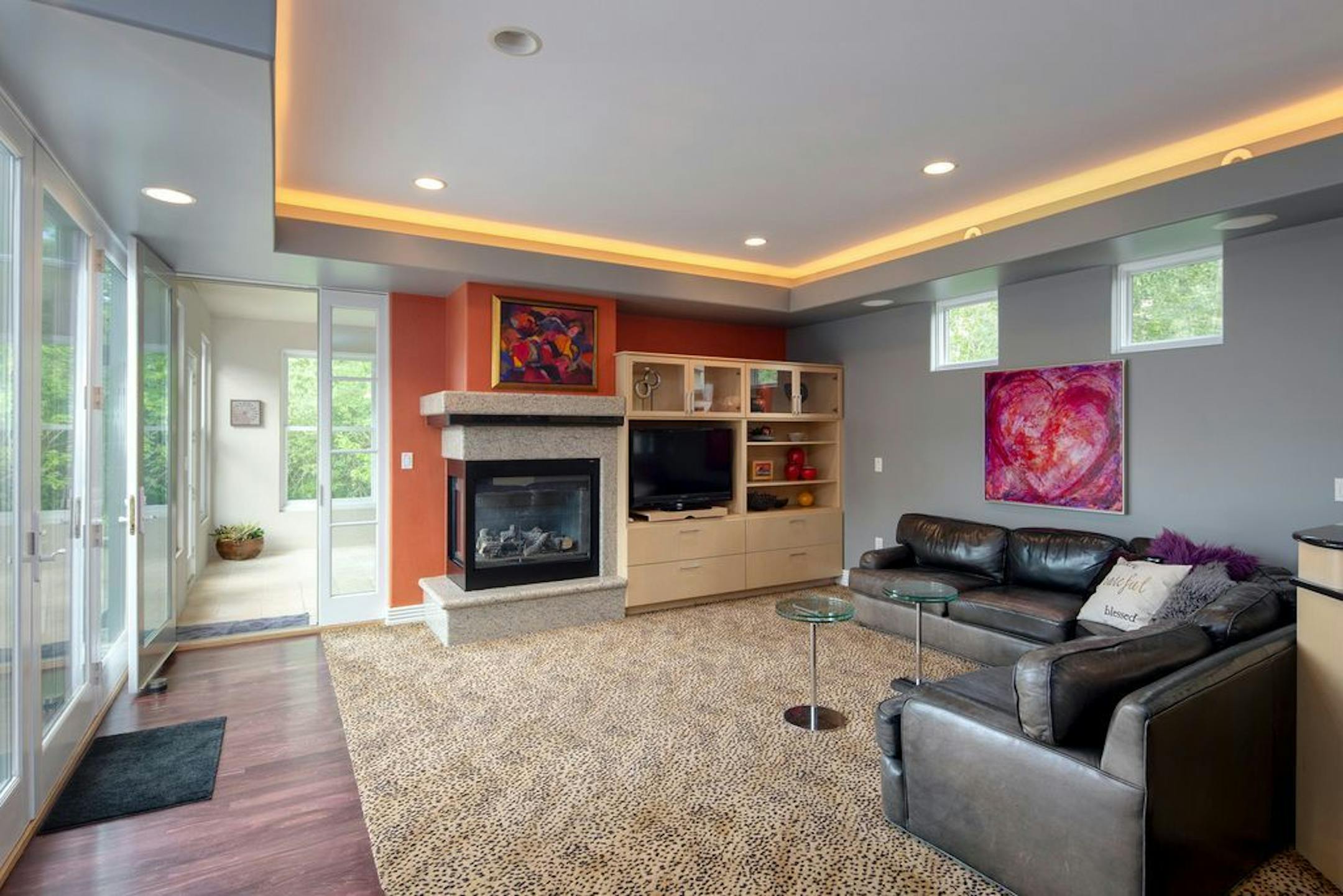 The family room, also with fireplace.