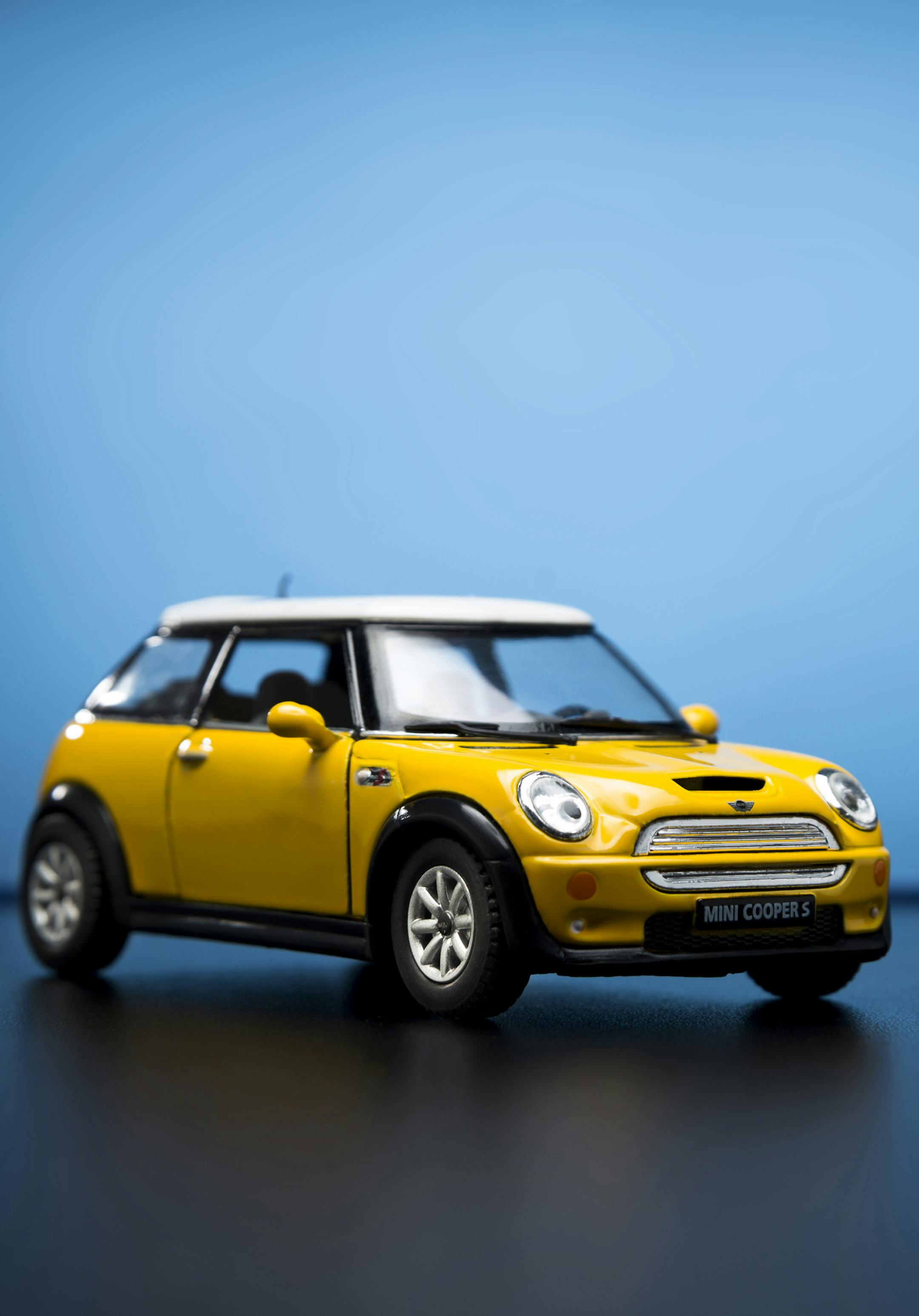 Izmir, Turkey - February 28, 2015. Mini Cooper S Toy car on blue background.