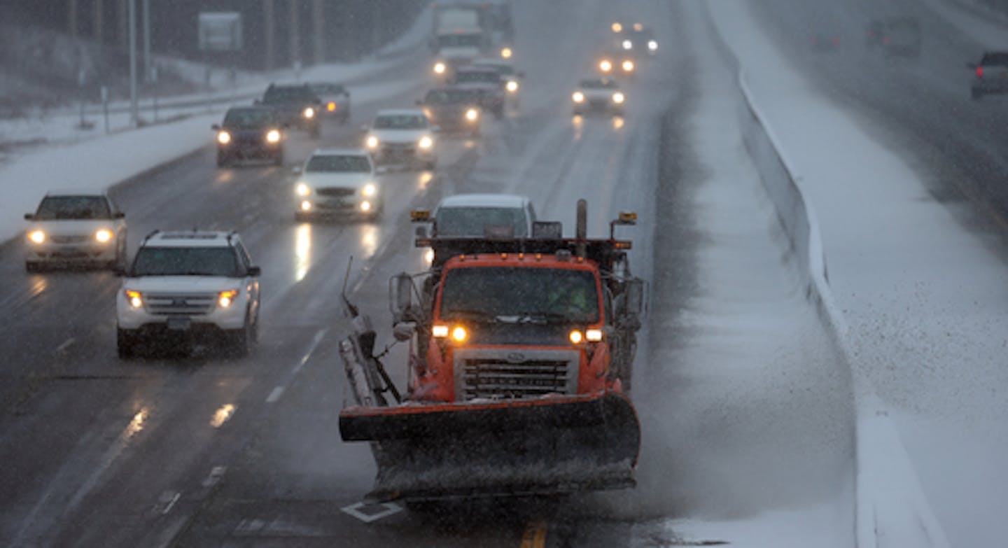 FILE PHOTO - A MnDOT snowplow cleared a stretch of north bound I-35 W south of Burnsville Parkway in 2017.