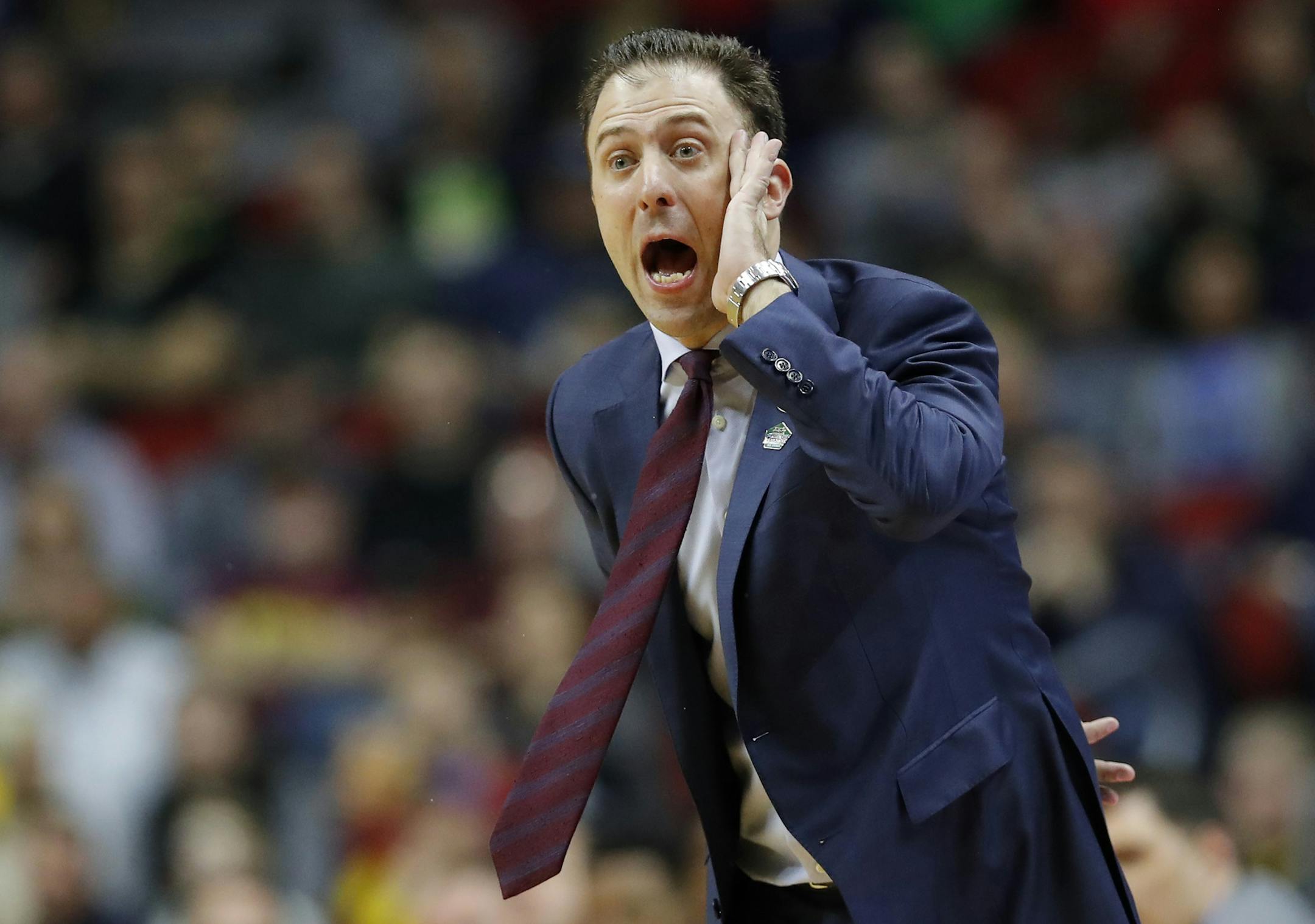 Minnesota head coach Richard Pitino directs his team during a first round men's college basketball game against Louisville in the NCAA Tournament, Thursday, March 21, 2019, in Des Moines, Iowa. (AP Photo/Charlie Neibergall)