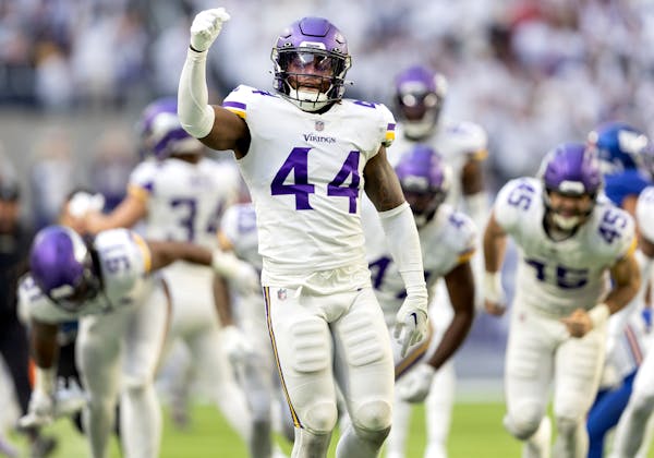 Josh Metellus (44) of the Minnesota Vikings celebrates after a blocked punt in the fourth quarter Saturday.