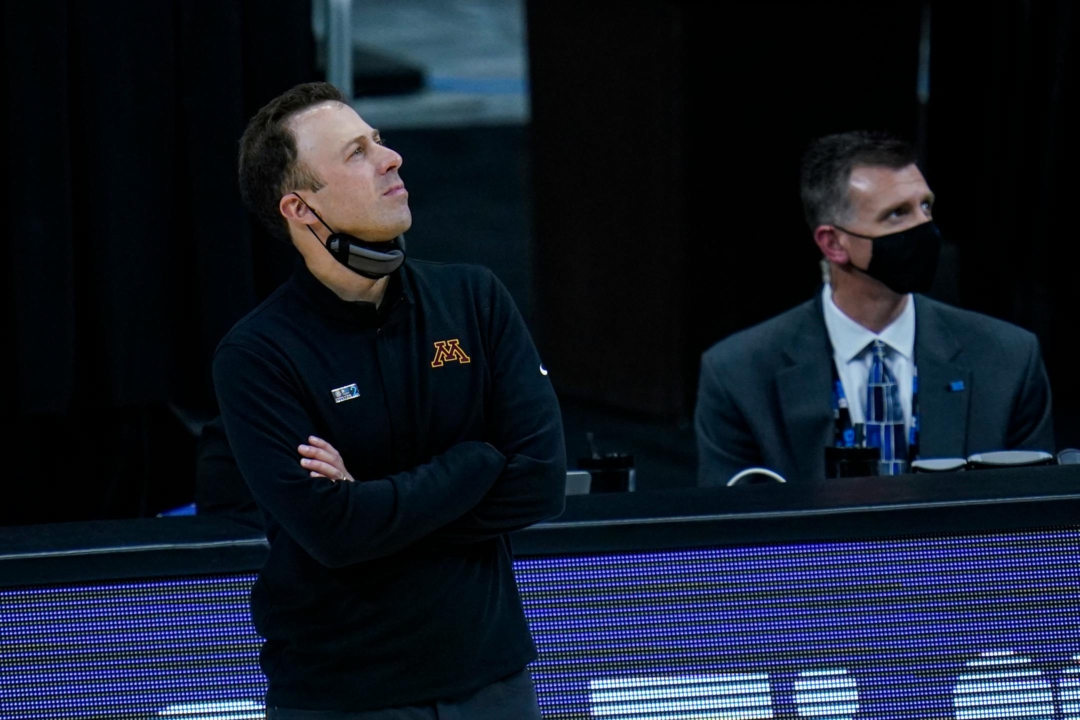 Minnesota head coach Richard Pitino on the bench in the second half of an NCAA college basketball game against Ohio State at the Big Ten Conference tournament in Indianapolis, Thursday, March 11, 2021. (AP Photo/Michael Conroy) ORG XMIT: NAF10