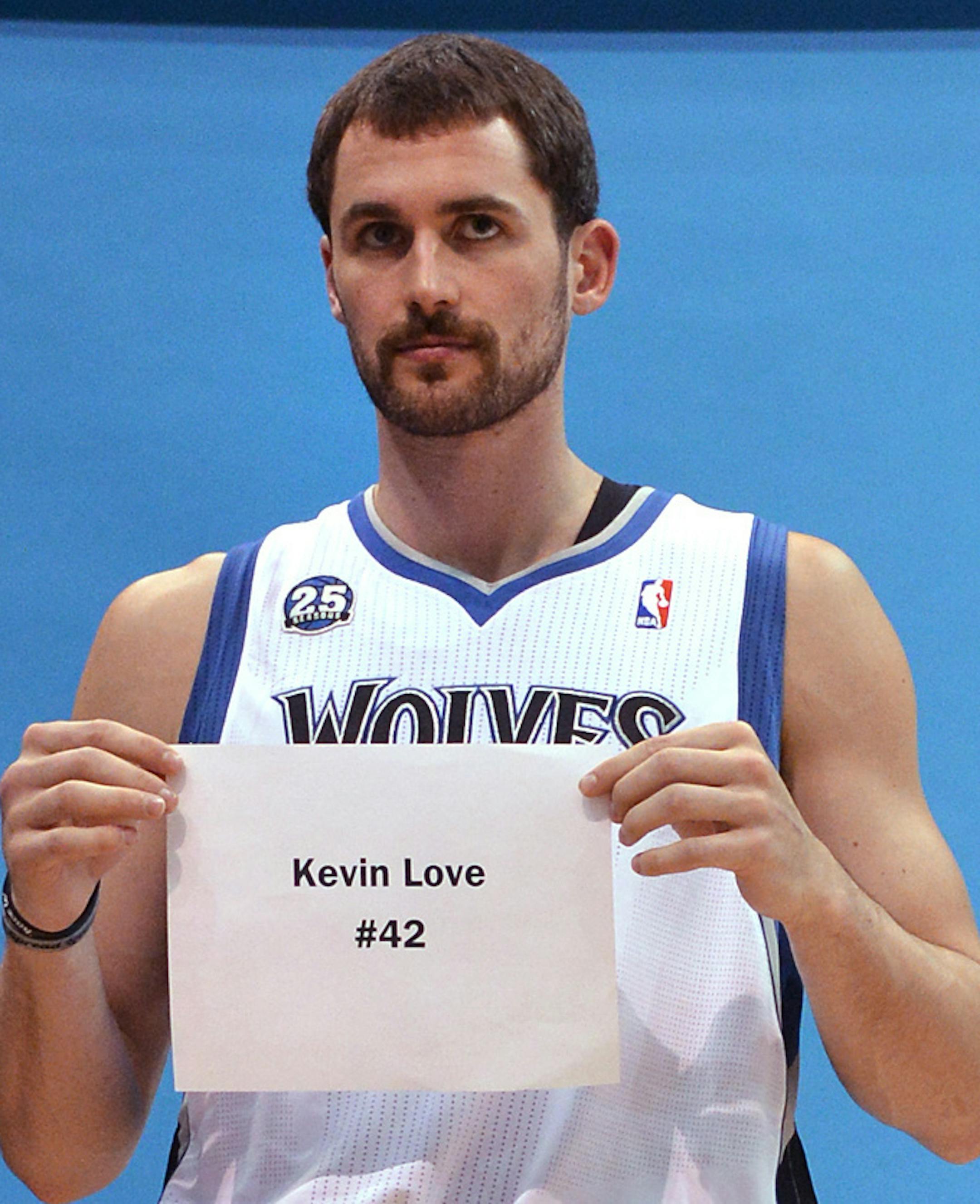 Kevin Love prepares to take promotional league photos Monday at the Target Center. ] (SPECIAL TO THE STAR TRIBUNE/BRE McGEE) **Kevin Love (42)