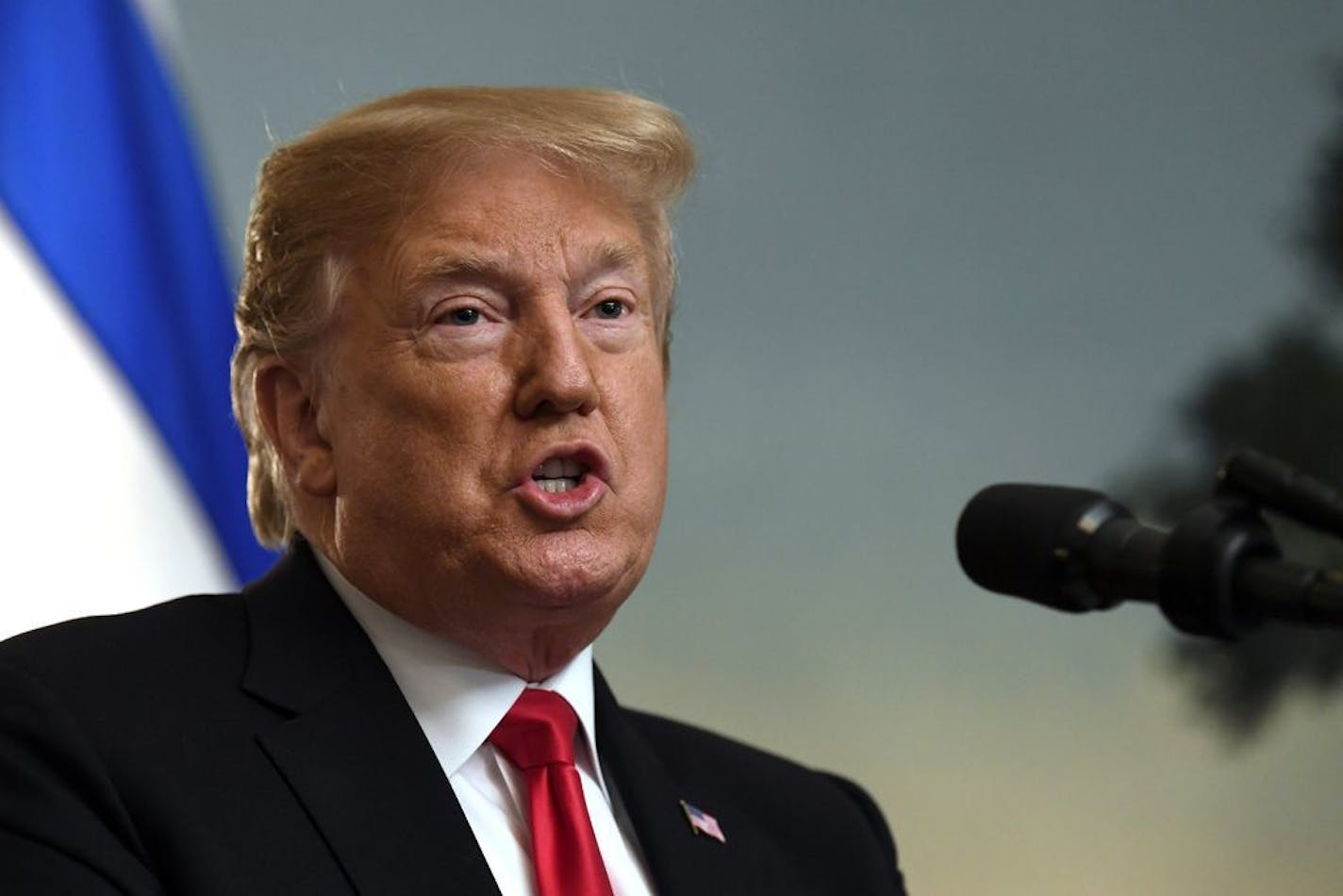 President Donald Trump speaks in the Diplomatic Reception Room Monday, March 25, 2019. Trump signed an official proclamation formally recognizing Israel's sovereignty over the Golan Heights.