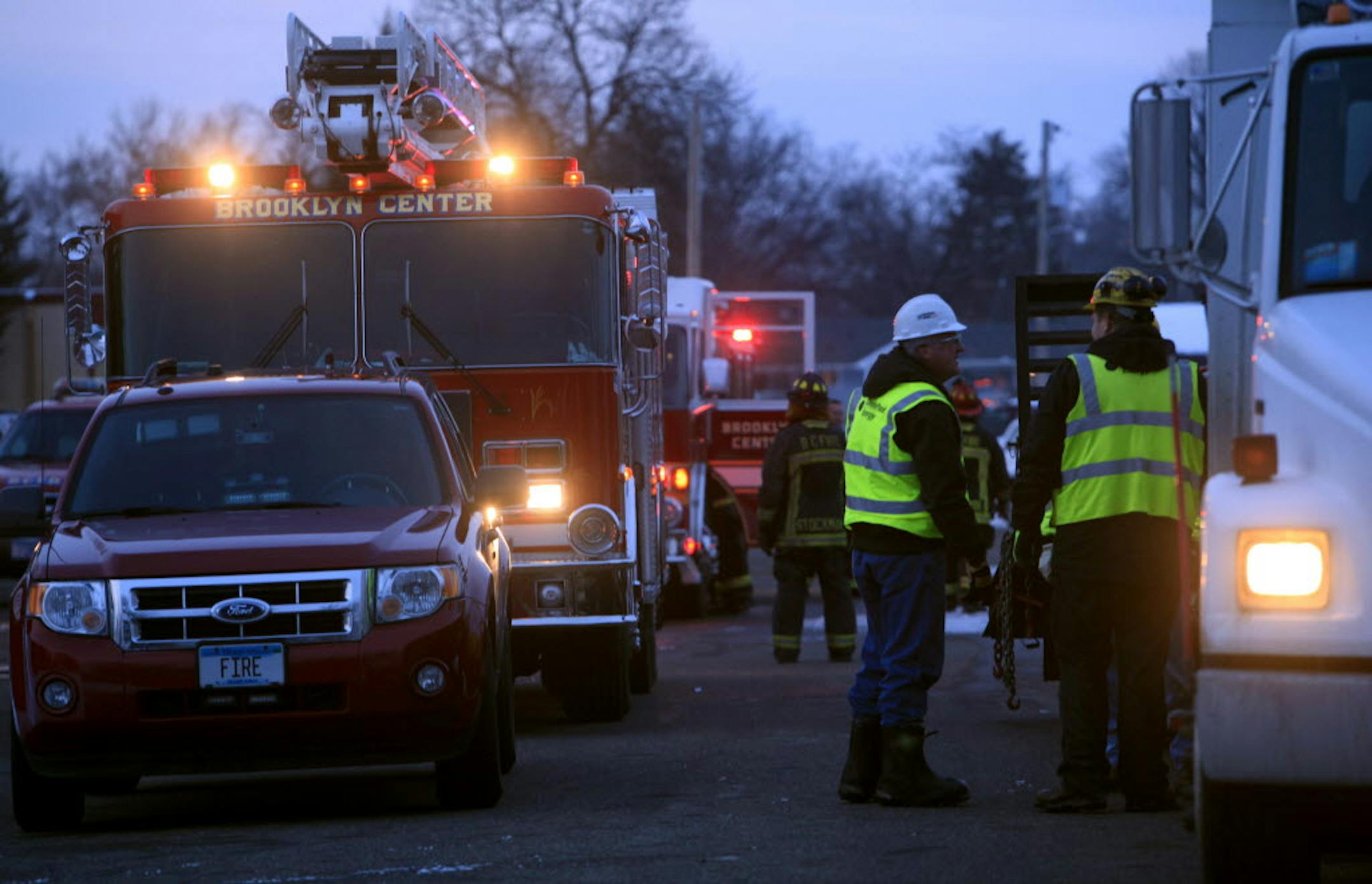 Firefighters at the scene of an explosion in a two-story classroom wing of Brookdale Christian Center.