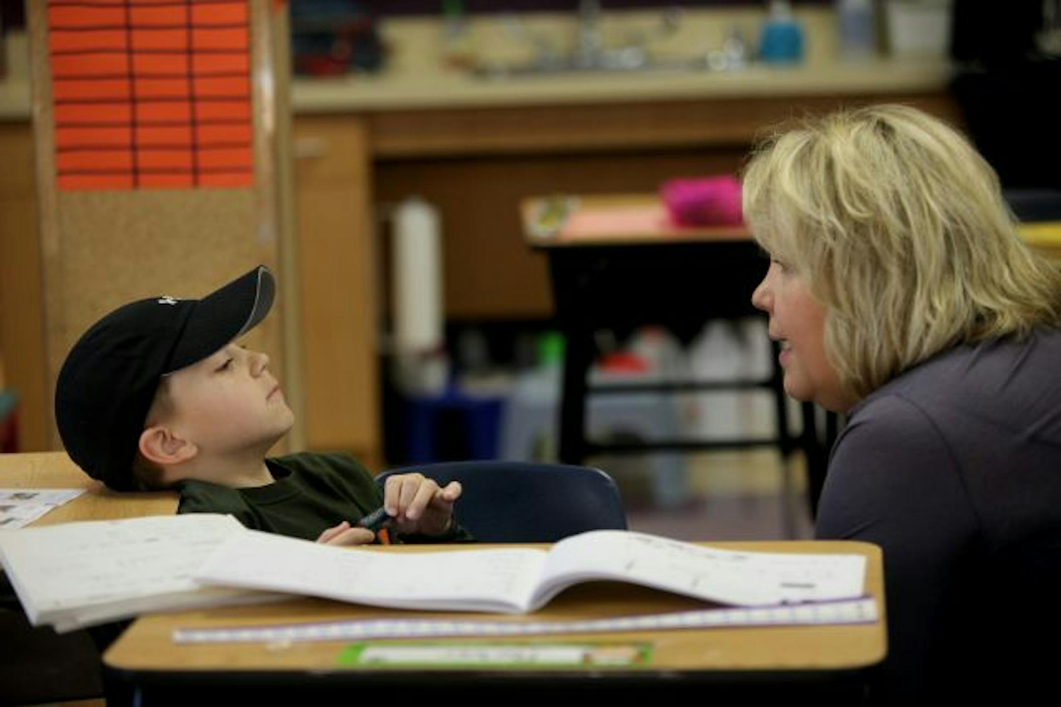Parker Thornton, 6, had a difficult time getting motivated as teacher and director Cindy Britain encouraged him to work.