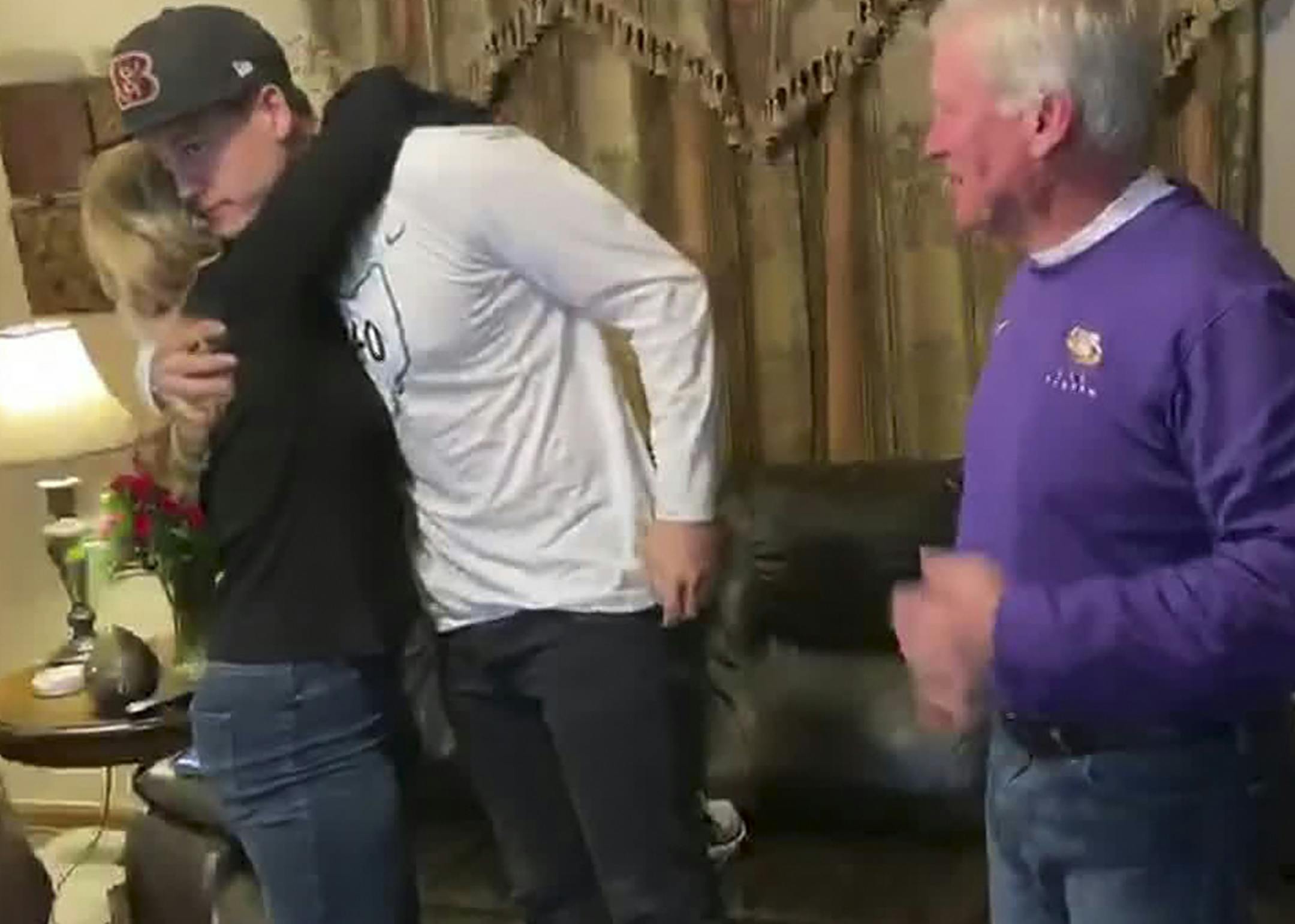 In this still image from video provided by the NFL, LSU quarterback Joe Burrow celebrates being chosen first by the Cincinnati Bengals during the NFL football draft, Thursday, April 23, 2020. (NFL via AP)