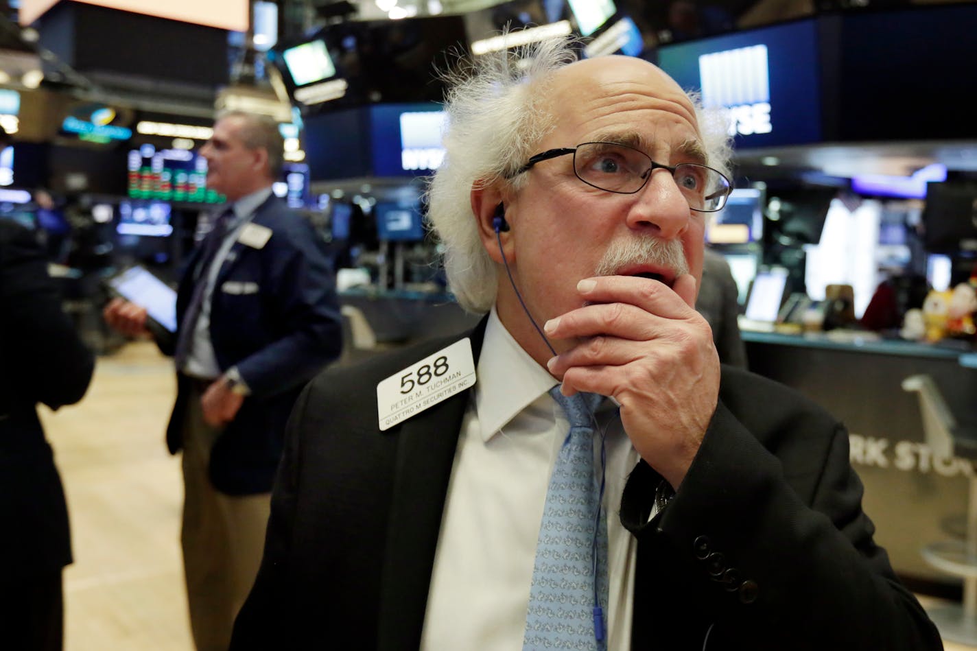 Trader Peter Tuchman works on the floor of the New York Stock Exchange, Friday, May 11, 2018.