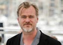 In this May 12, 2018, photo, director Christopher Nolan poses during a photo call at the 71st international film festival in Cannes, southern France. 
