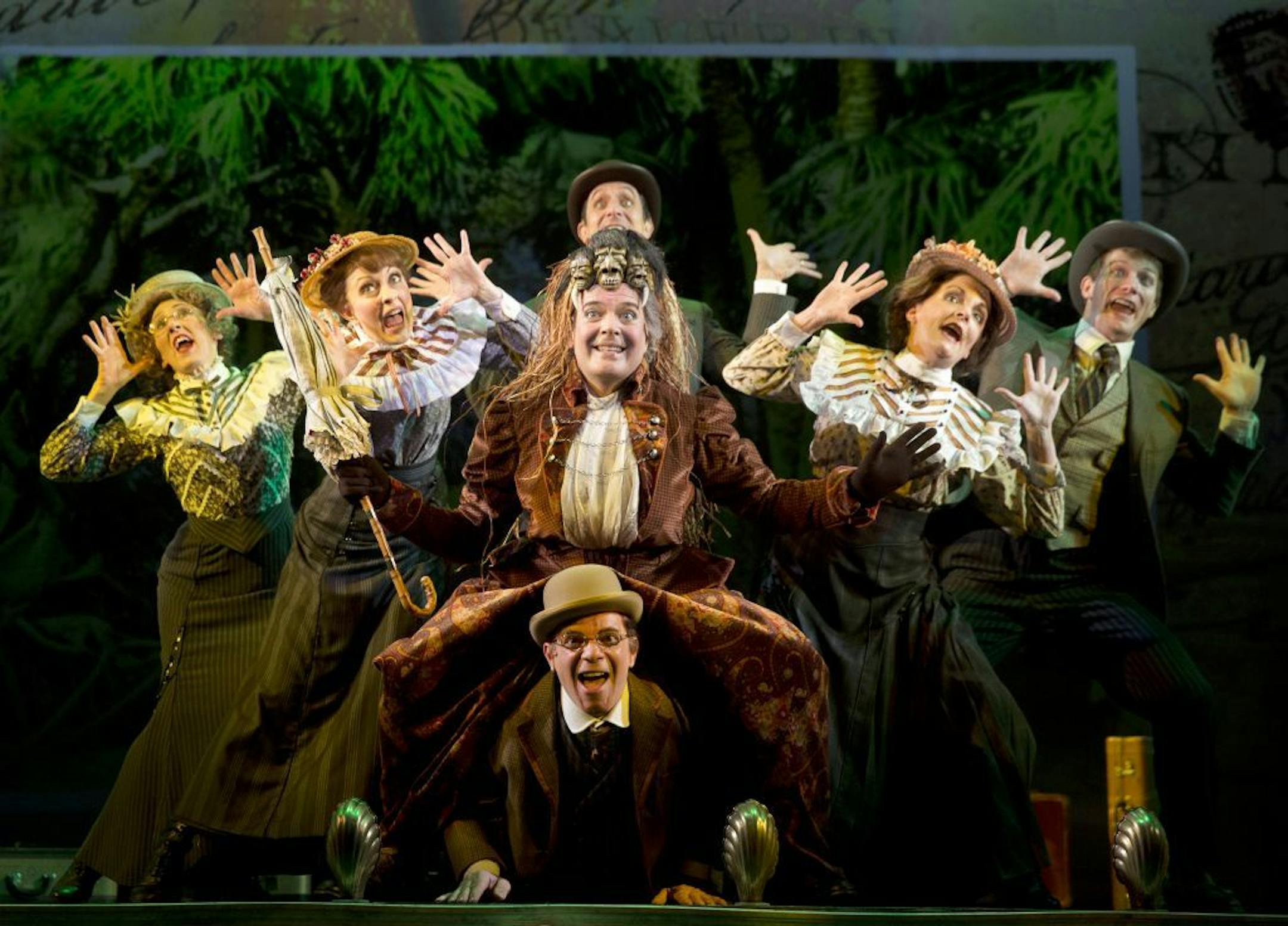 This theater image released by The O+M Company Jefferson Mays, center, during a performance of "A Gentleman's Guide to Love and Murder," at the Walter Kerr Theatre in New York.