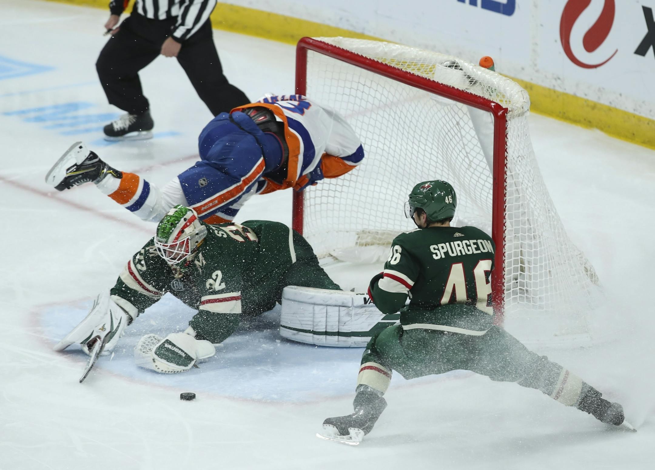 Wild defenseman Jared Spurgeon helped out in front of the net during Sunday's game against the Islanders.