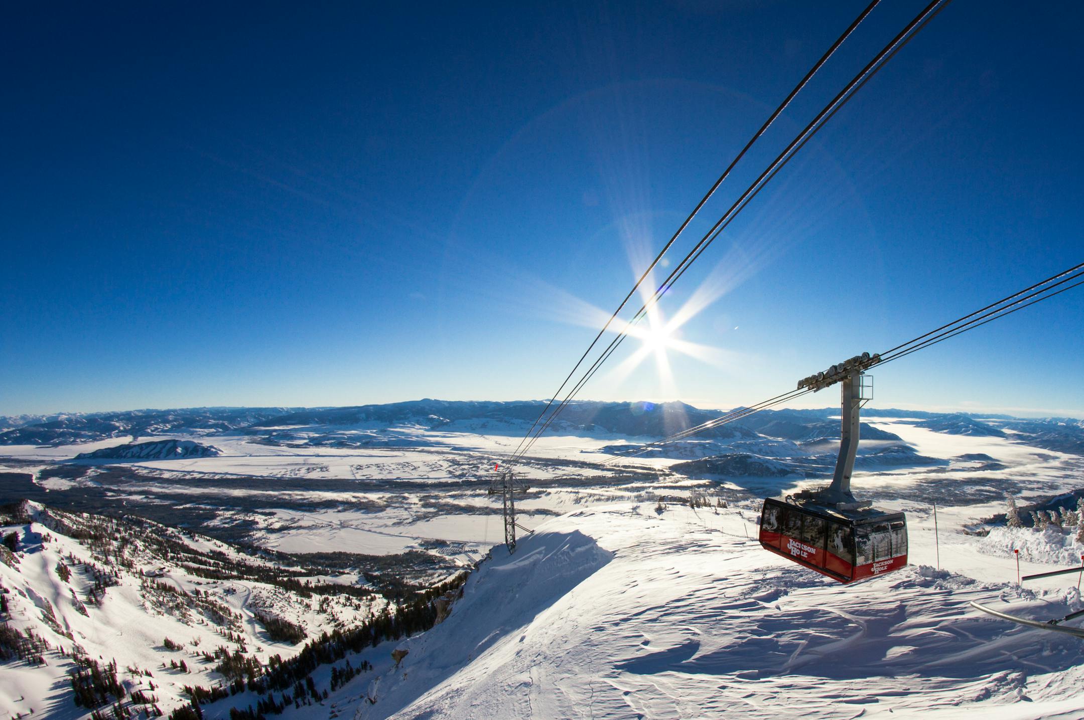 100 people can fit in "Big Red," the aerial tram that takes folks 4,139 vertical feet from Teton Village to the summit of Rendezvous Mountain, where you can descend on skis or kick back with a plate of waffles. (Jackson Hole Mountain Resort) ORG XMIT: 1245003